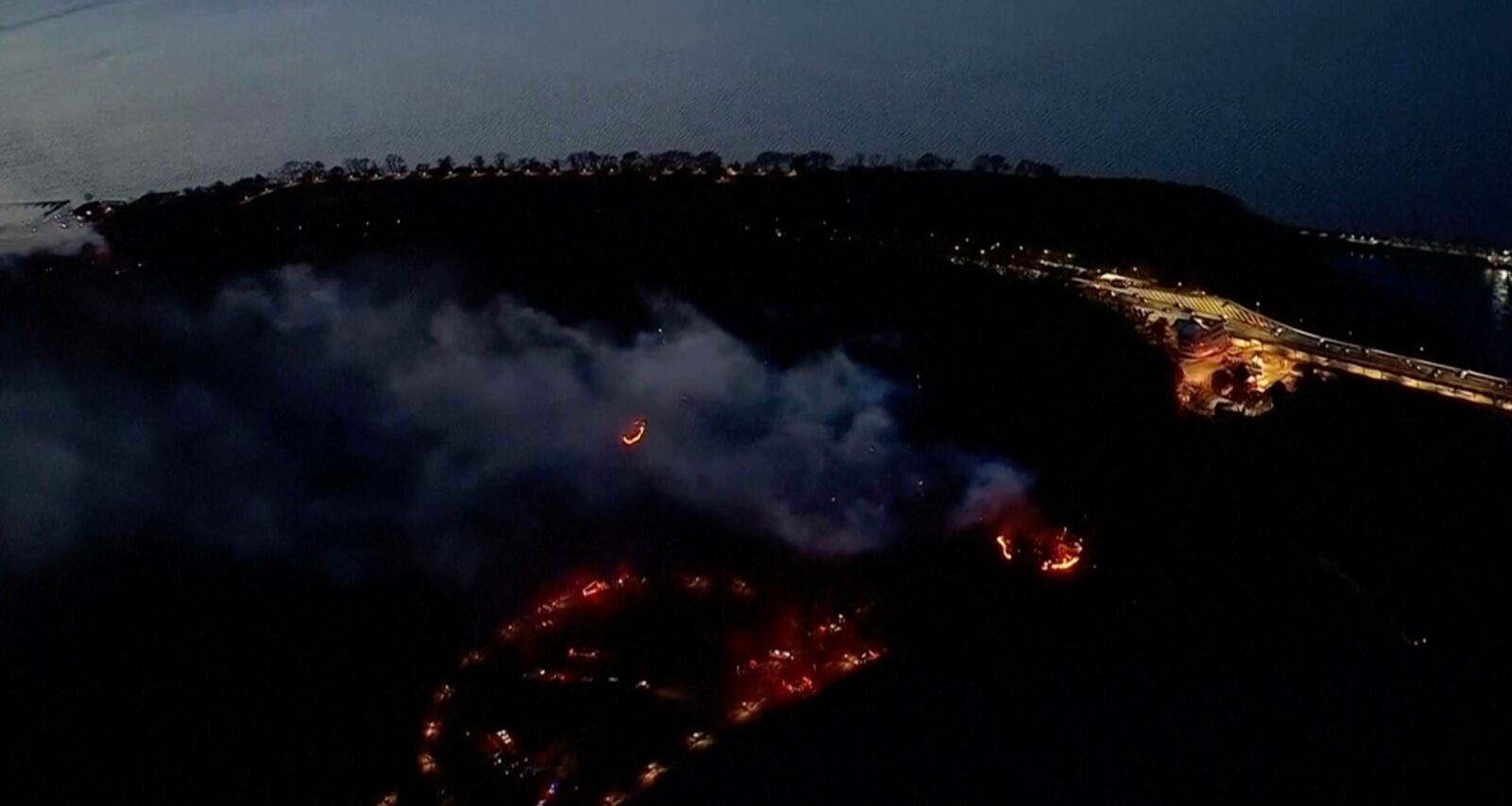 This aerial image taken from video shows a brush fire that broke out in a park on the northern tip of Manhattan in Inwood, N.Y., Wednesday, Nov. 13, 2024. (WABC-TV via AP)