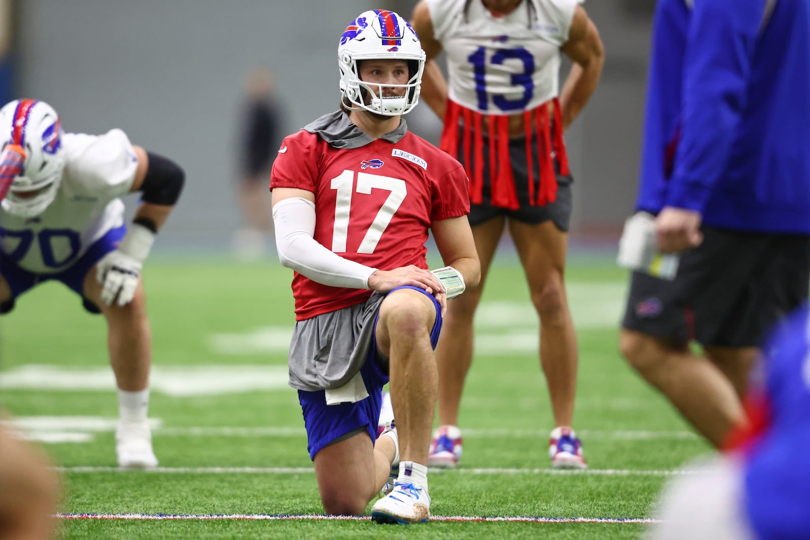 Buffalo Bills quarterback Josh Allen (17) stretches during NFL football practice in Orchard Park, N.Y., Thursday, Jan. 23, 2025. (AP Photo/Jeffrey T. Barnes)