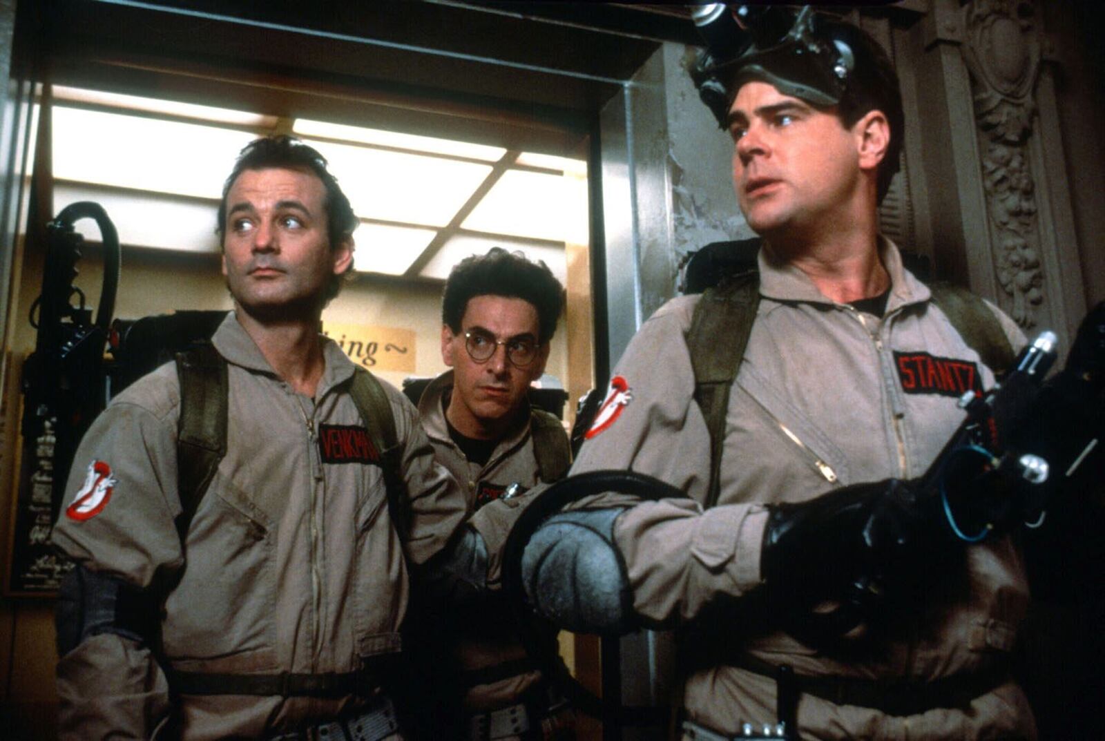 A scene from the 1984 film GHOSTBUSTERS. From left: Bill Murray, Harold Ramis and Dan Aykroyd. Credit: Columbia Pictures.