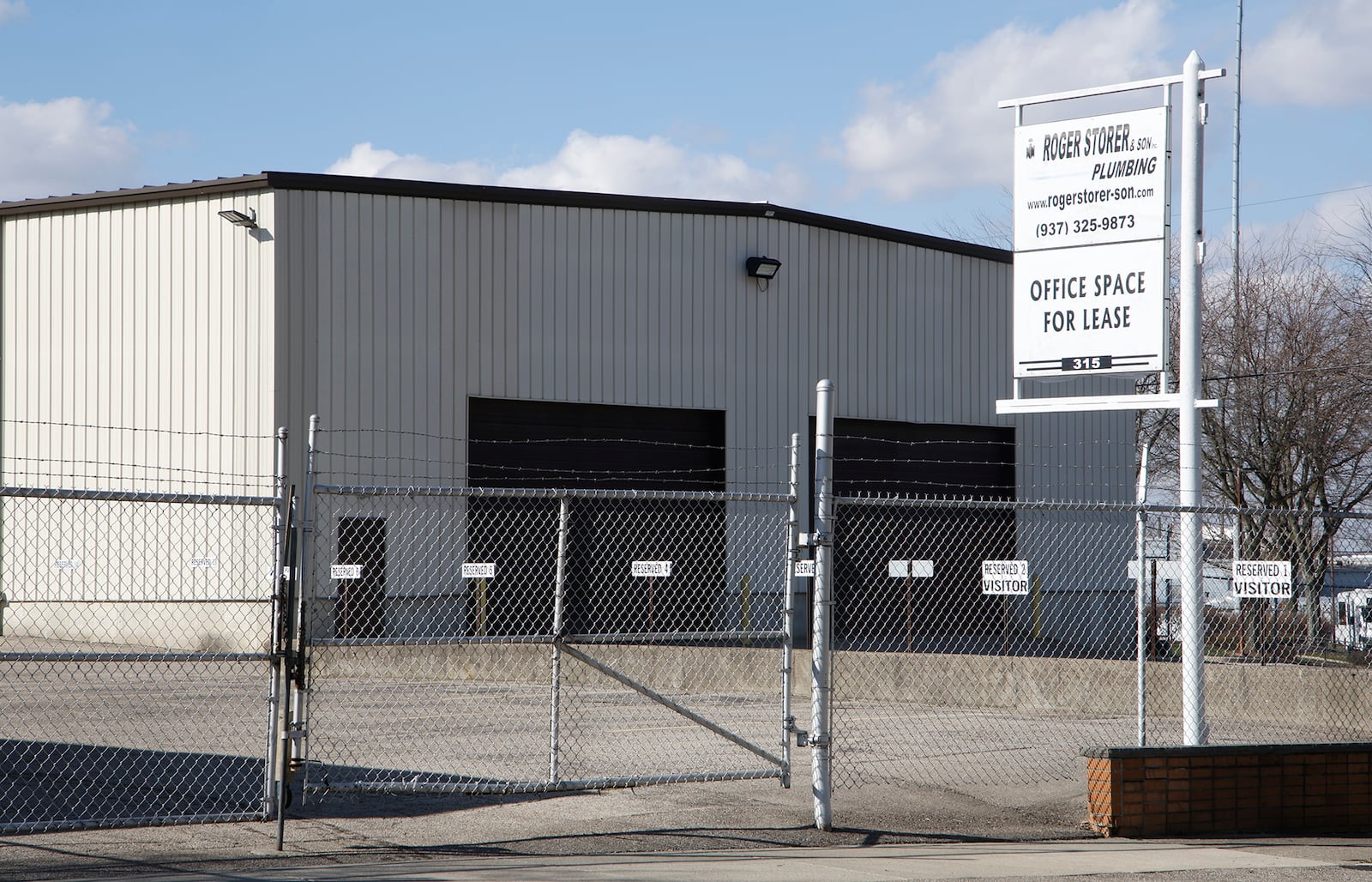 The former Roger Storer & Son Plumbing location on South Center Street was recently purchased by the Clark County Library. BILL LACKEY/STAFF