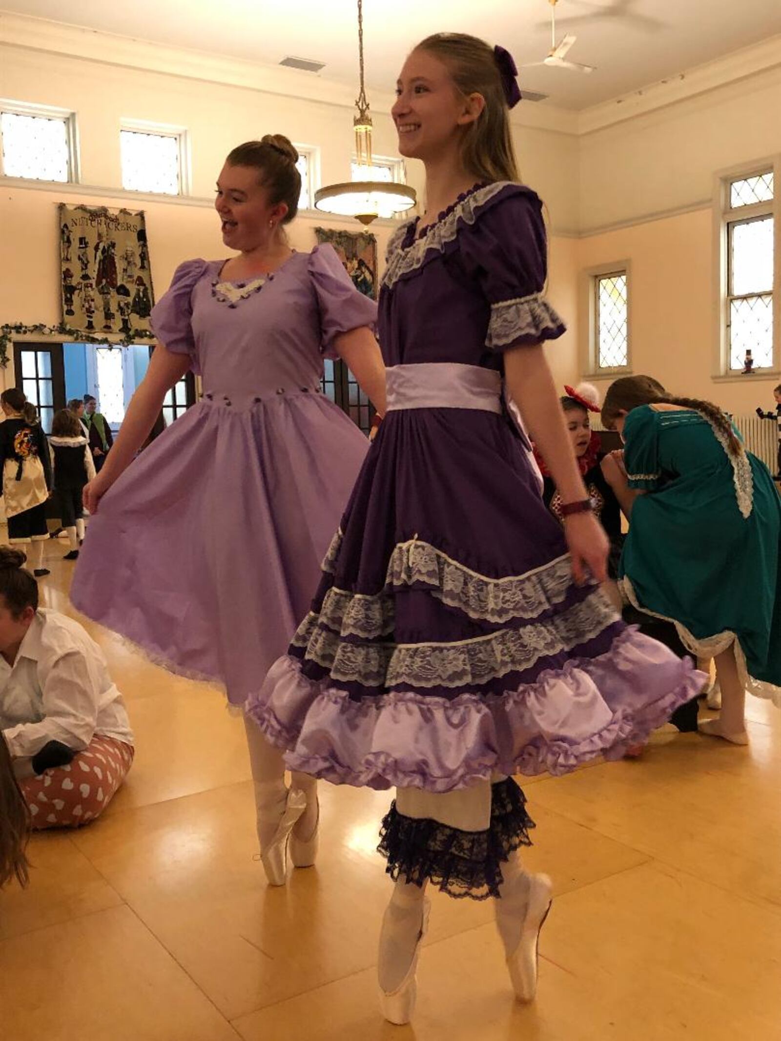 Ellah Smith, left, and Heather Hare warm up prior to a rehearsal for the Ohio Performing Arts Institute's 33rd annual production of "The Nutcracker."