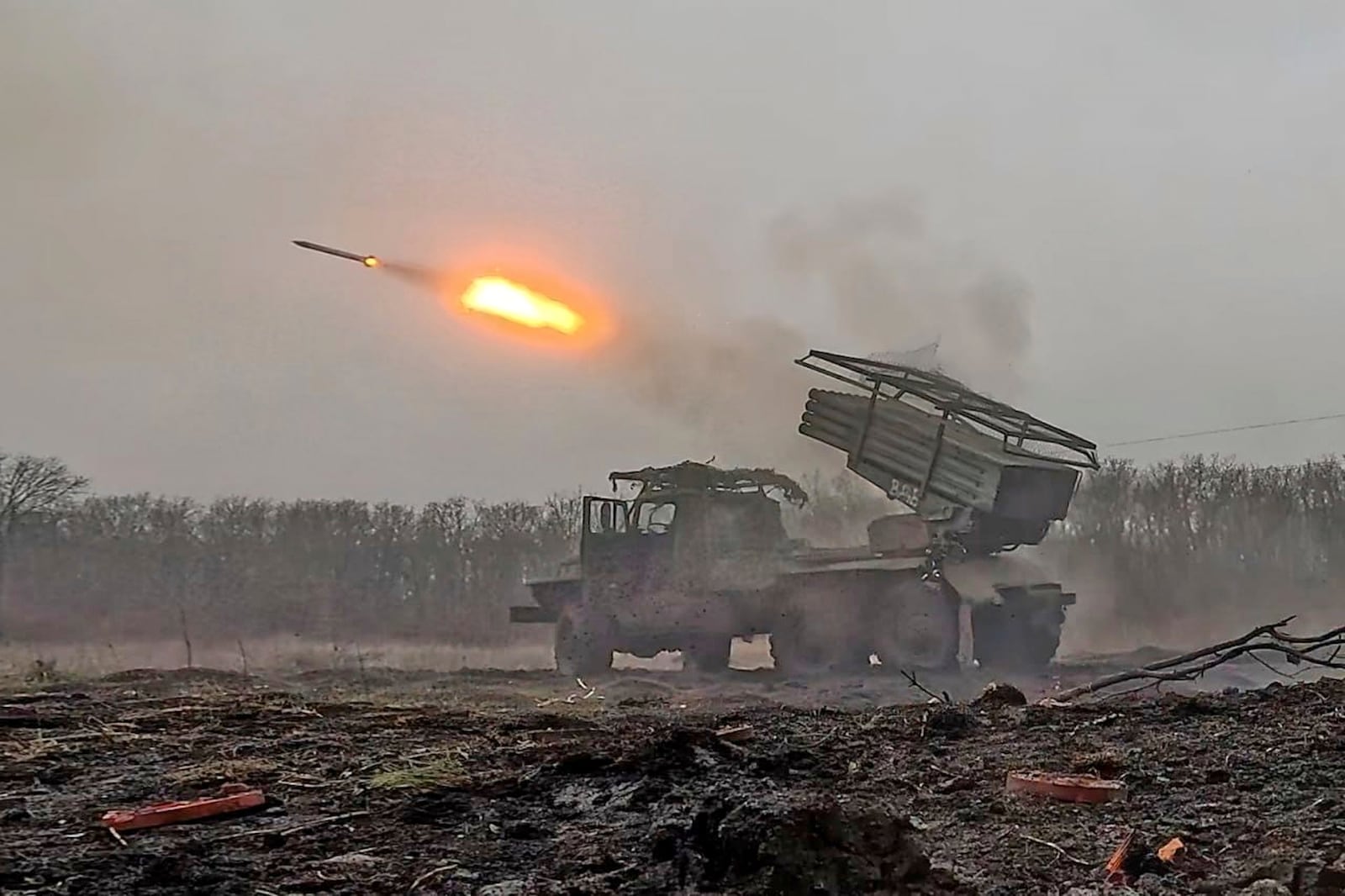 In this photo distributed by Russian Defense Ministry Press Service on Thursday, March 20, 2025, a Russian "Grad" self-propelled multiple rocket launcher fires towards Ukrainian positions in Ukraine. (Russian Defense Ministry Press Service via AP)