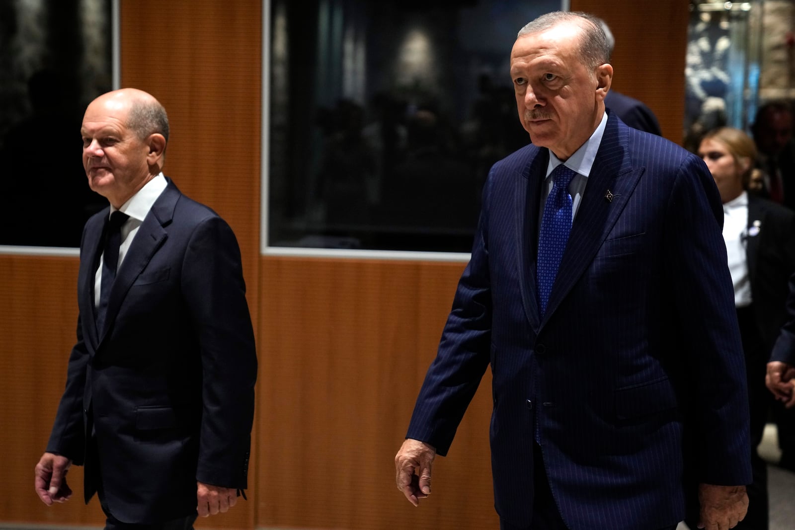 Turkey's President Recep Tayyip Erdogan, right, and Germany's Chancellor Olaf Scholz, arrive to hold a presser in Istanbul, Turkey, Saturday, Oct. 19, 2024. (AP Photo/Khalil Hamra)