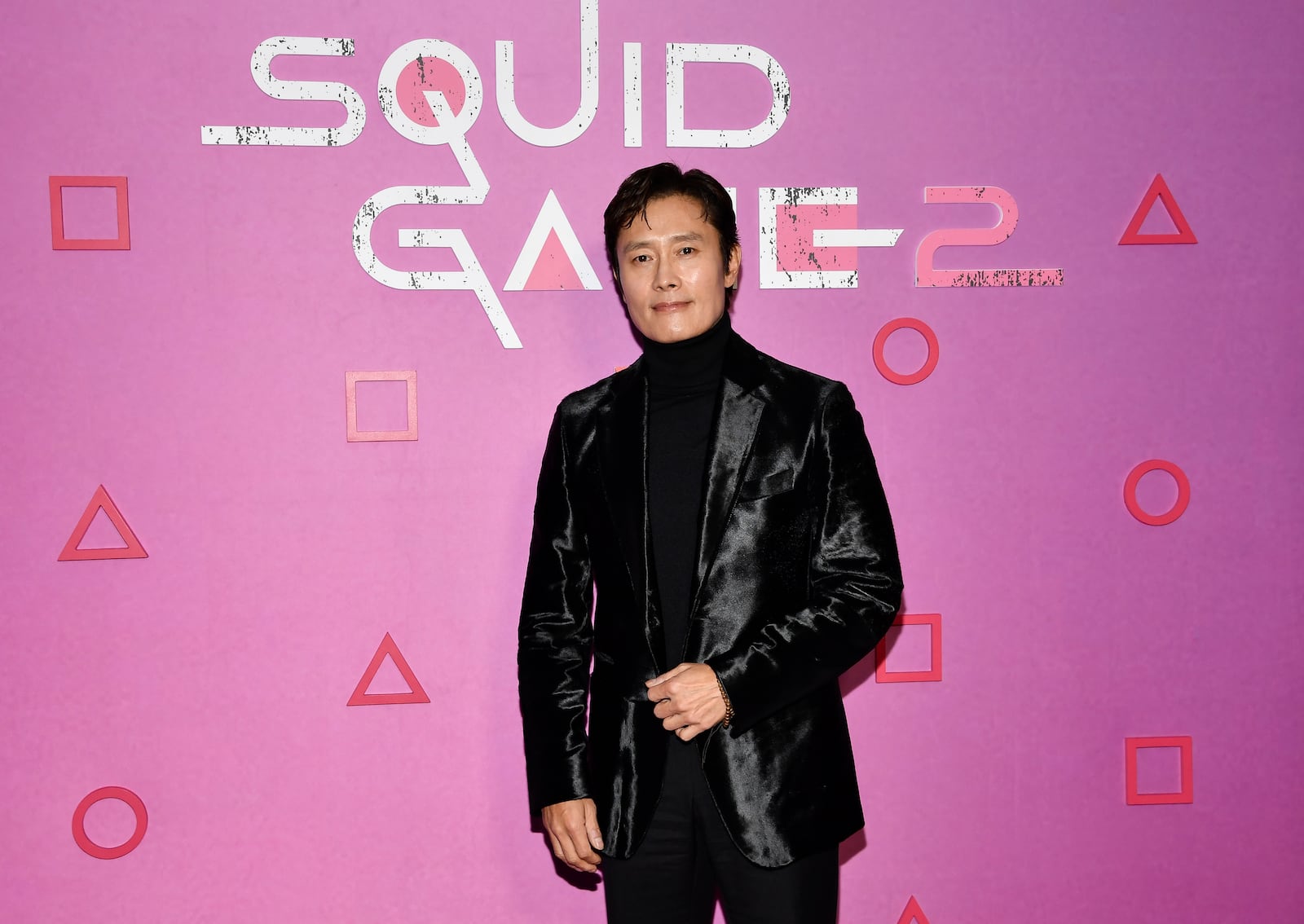 Actor Lee Byung-hun poses during a photo call for Netflix's "Squid Game" season two at Metrograph on Monday, Dec. 16, 2024, in New York. (Photo by Evan Agostini/Invision/AP)