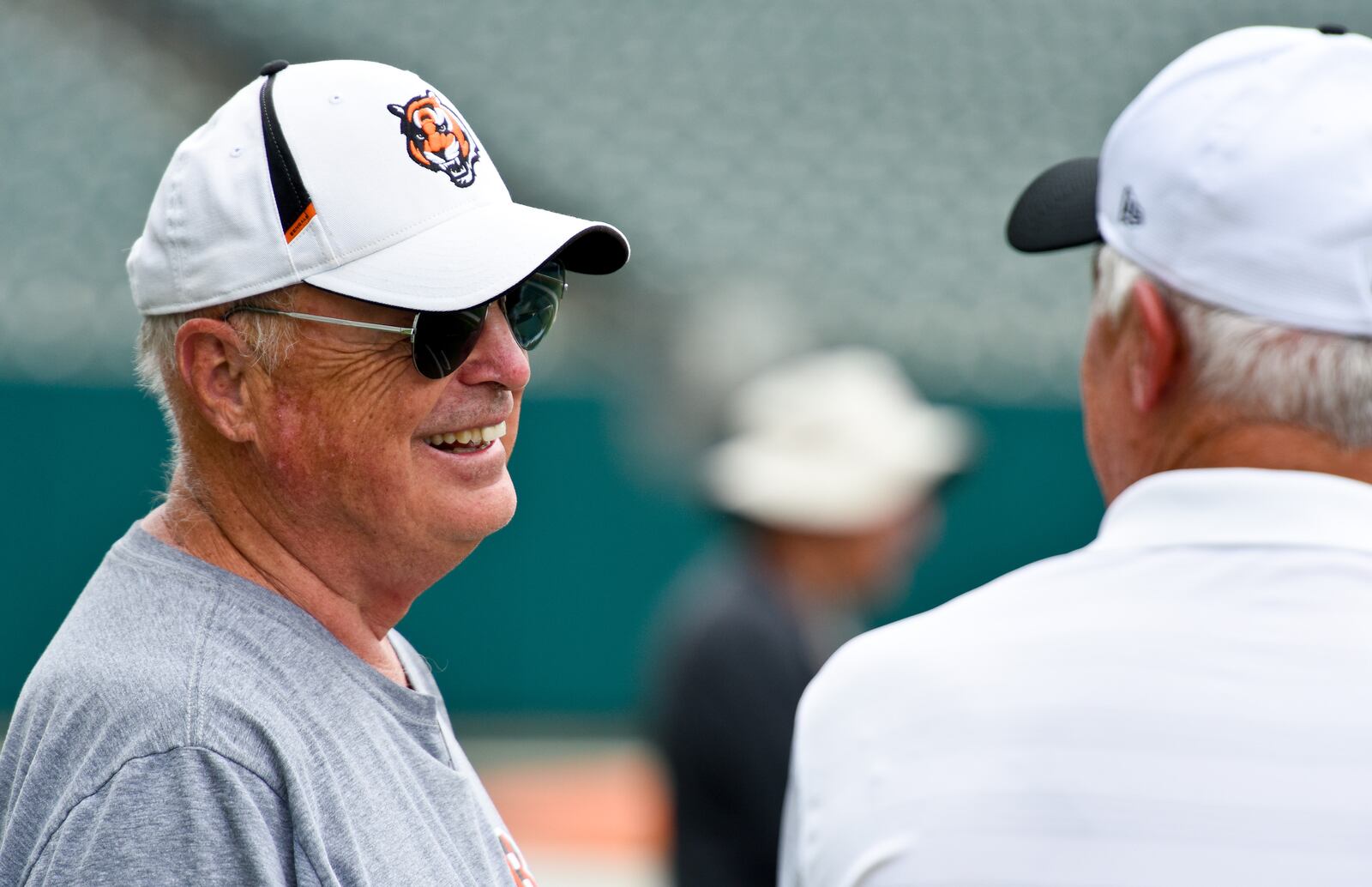 Bengals owner Mike Brown, left, talks to former Bengals quarterback Ken Anderson during Bengals minicamp Wednesday, June 17 at Paul Brown Stadium in Cincinnati. NICK GRAHAM/STAFF