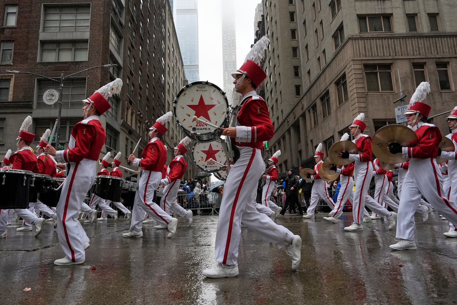 The Macy's Great American Marching Band plays as it heads down Sixth Avenue during the Macy's Thanksgiving Day Parade, Thursday, Nov. 28, 2024, in New York. (AP Photo/Julia Demaree Nikhinson)