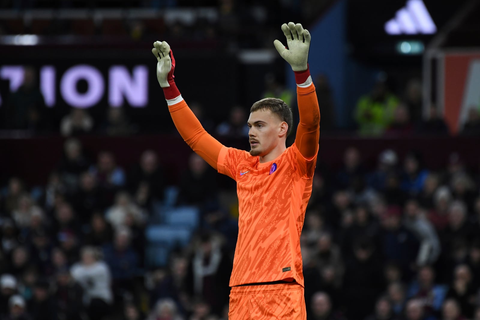 Chelsea's goalkeeper Filip Joergensen reacts during the English Premier League soccer match between Aston Villa and Chelsea at Villa Park in Birmingham, England, Saturday, Feb. 22, 2025. (AP Photo/Rui Viera)