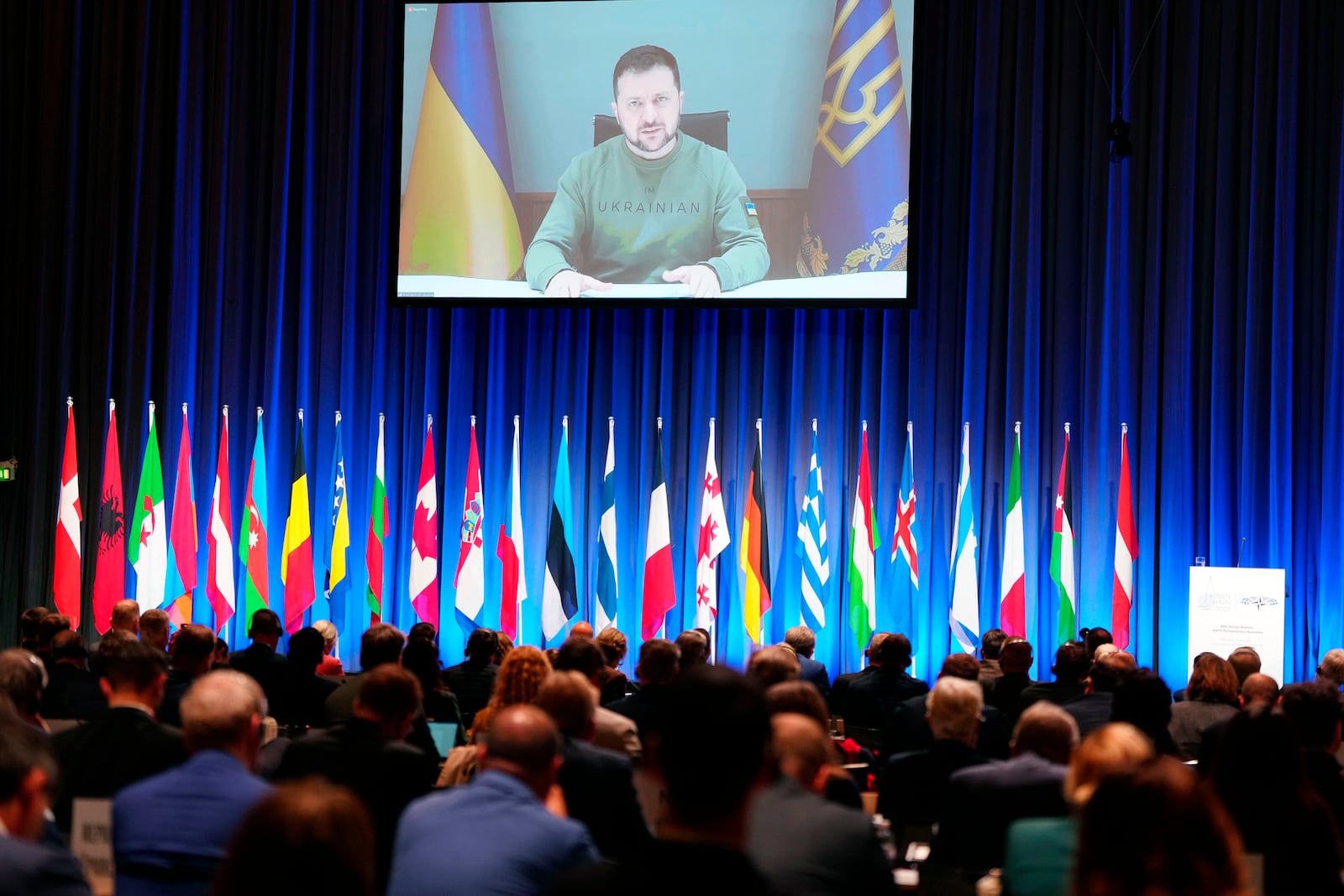 Ukraine President Volodymyr Zelenskyy, speaks via video conference, during the NATO Parliamentary Assembly, in Copenhagen, Denmark, Monday, Oct. 9, 2023. (Liselotte Sabroe/Ritzau Scanpix via AP)