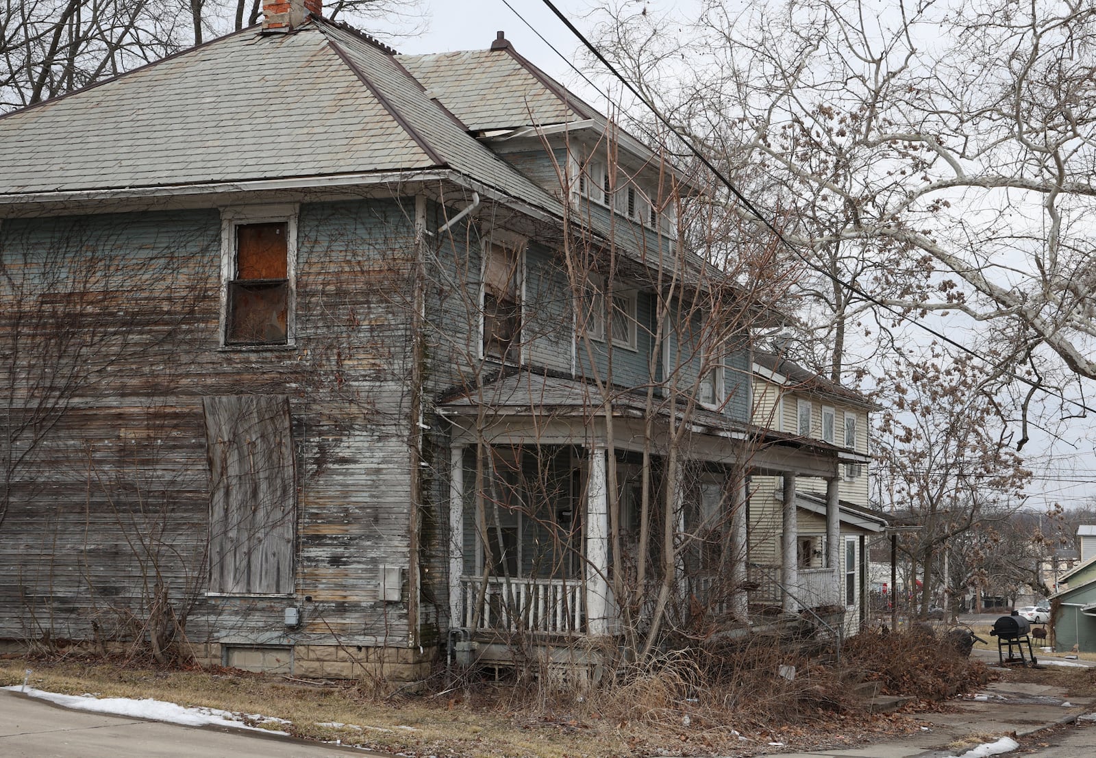 Springfield neighborhood with several condemned houses. BILL LACKEY/STAFF