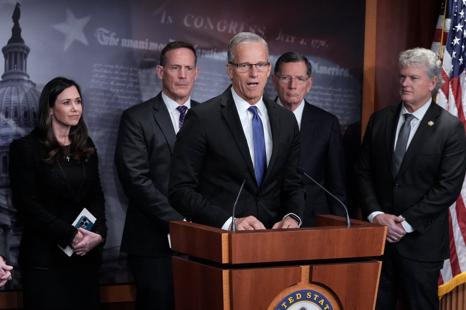 Senate Majority Leader John Thune, R-S.D., center, joined from left by Sen. Katie Britt, R-Ala., Sen. Ted Budd, R-N.C., Majority Whip John Barrasso, R-Wyo., and Rep. Mike Collins, R-Ga., speaks to reporters about the Laken Riley Act, a bill to detain unauthorized immigrants who have been accused of certain crimes, at the Capitol in Washington, Thursday, Jan. 9, 2025. Georgia nursing student Laken Riley was killed last year by a Venezuelan man who entered the U.S. illegally and was allowed to stay to pursue his immigration case. (AP Photo/J. Scott Applewhite)