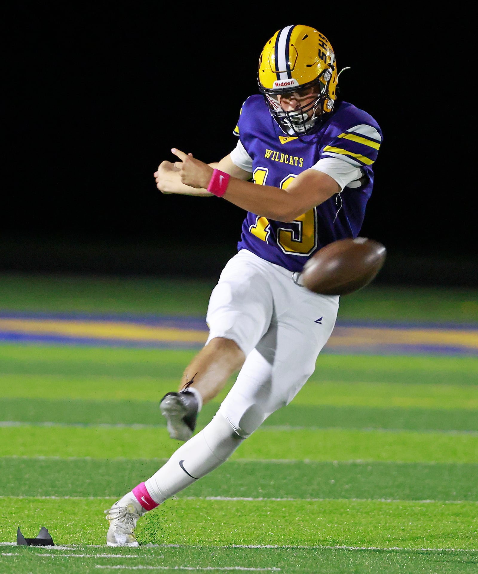 Springfield's Nathan Hudson kicks off the ball to Fairmont. BILL LACKEY/STAFF