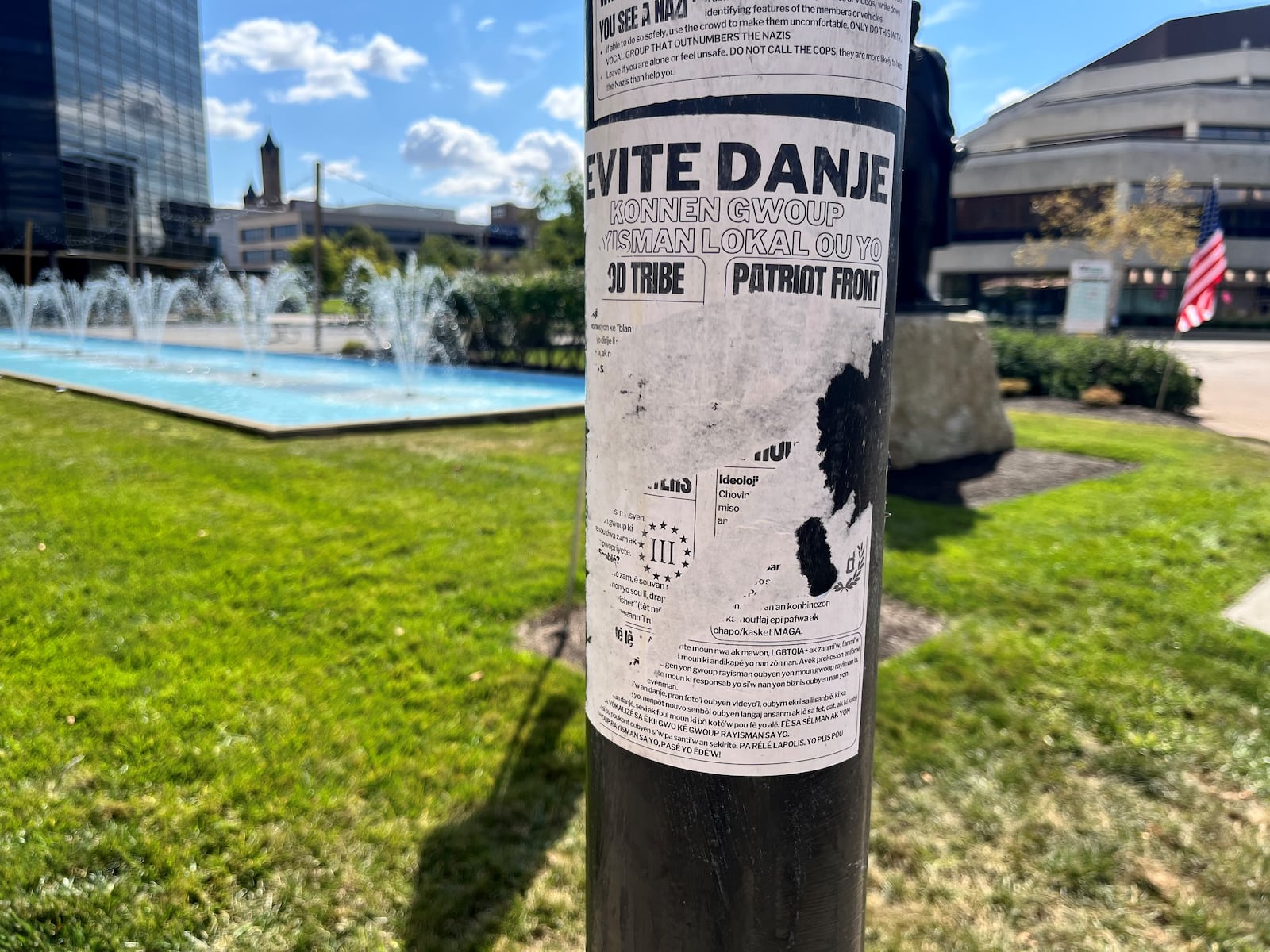 Flyers on the City Hall Plaza in Springfield warn about hate groups. JESSICA OROZCO/STAFF