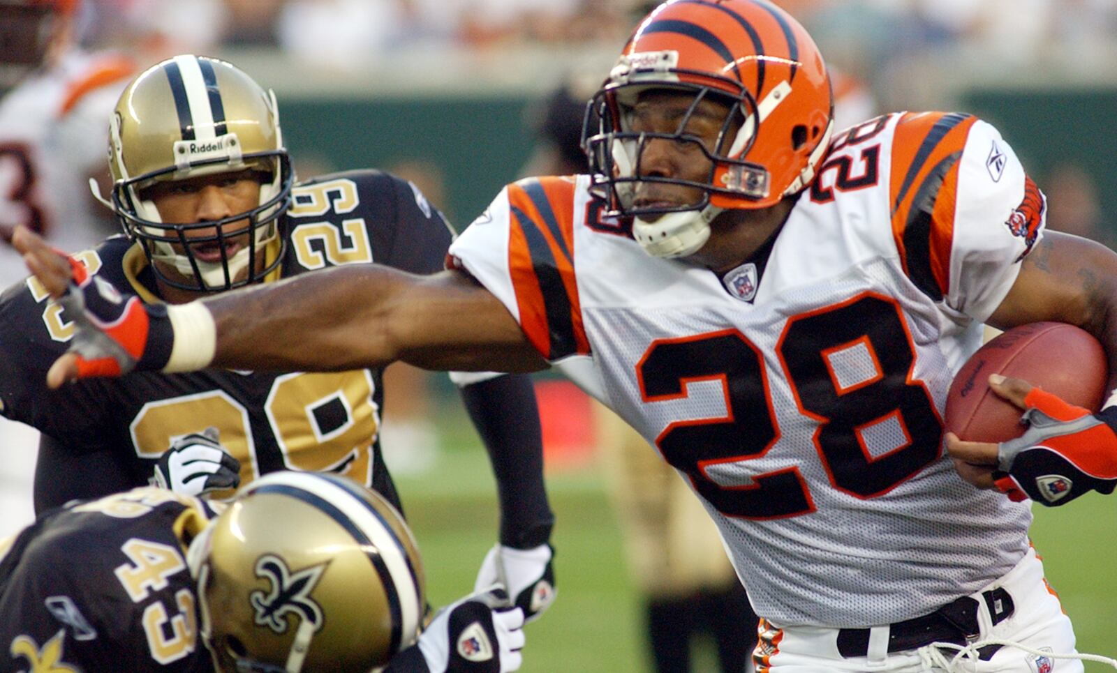  Corey Dillion runs for yards for the Bengals vs the Saints during a game in 2002. Cox First Media fil photo