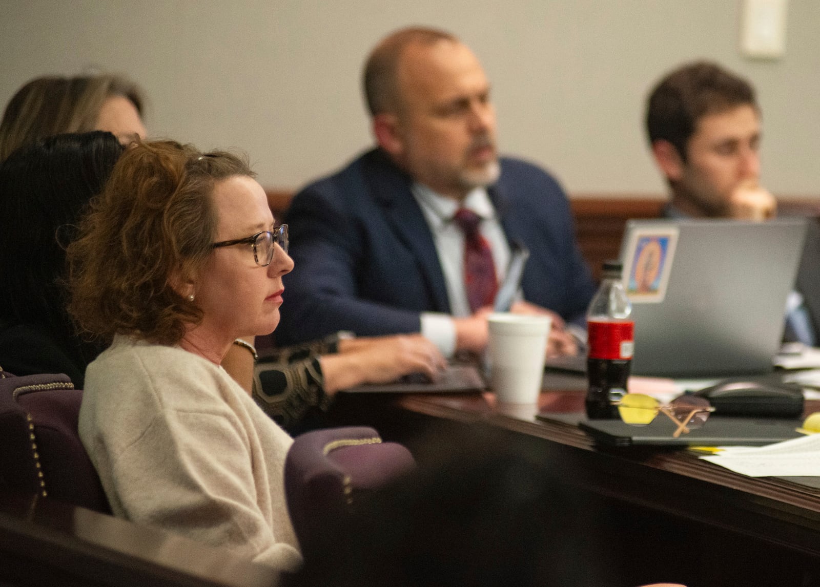 Former Brunswick Judicial Circuit District Attorney Jackie Johnson listens to opening statements on Tuesday, Jan. 28, 2025, in Brunswick, Ga., with her defense team during the opening day of her trial on charges of obstruction of justice and violating her oath of office. (Terry Dickson/The Brunswick News via AP, Pool)