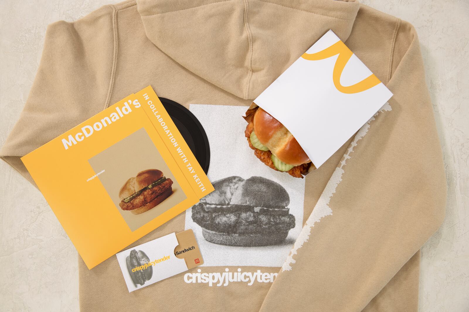 In honor of the release of its Crispy Chicken Sandwich, McDonald's will be offering customers a chance to score a vinyl, sweatshirt and free sandwich.