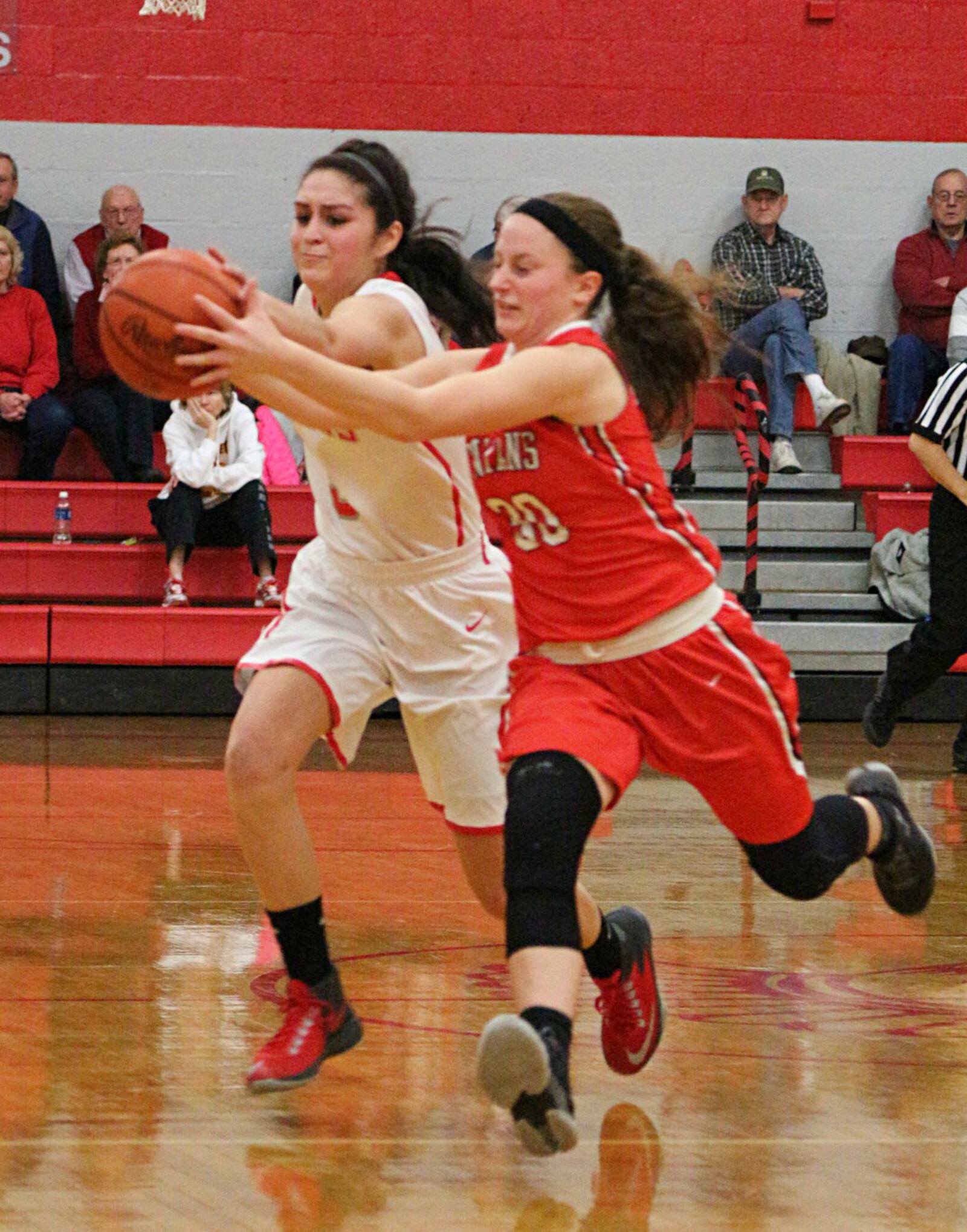 Southeastern’s Leslie Flores (left) and Cedarville’s Maggie Coe battle for a loose ball. GREG BILLING / CONTRIBUTED