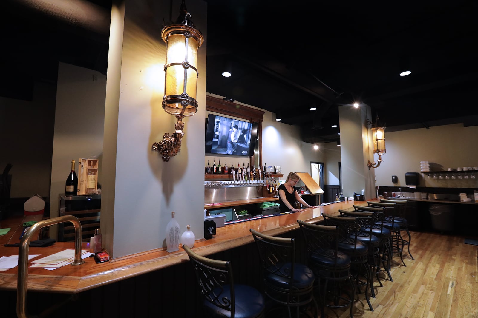 The bar area of Fratelli's Famiglia Ristorante. BILL LACKEY/STAFF