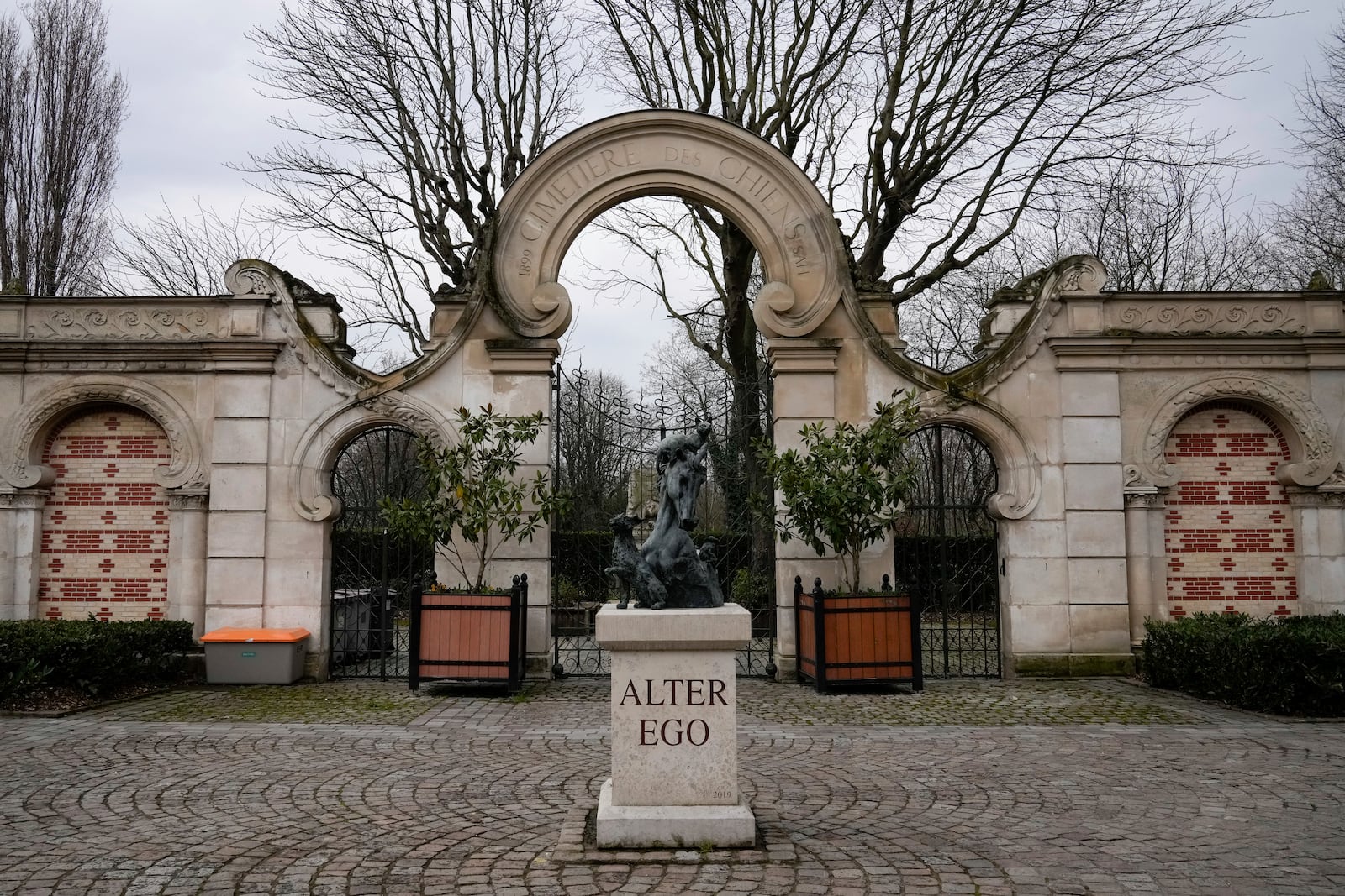 Outside view of the entrance of the pet cemetery of Asnieres-sur-Seine, west of Paris, Friday, Feb. 21, 2025. (AP Photo/Michel Euler)