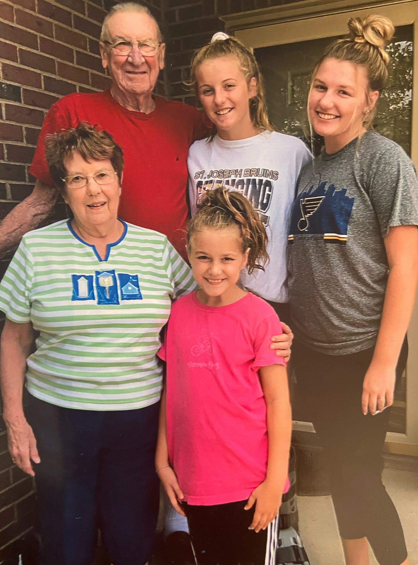 Former South High School Athletic Director C. Duane Baker, top left, is pictured with wife Patricia, bottom left, and granddaughters: Isabella, far right; Avamarie, top middle; and Vivianna.