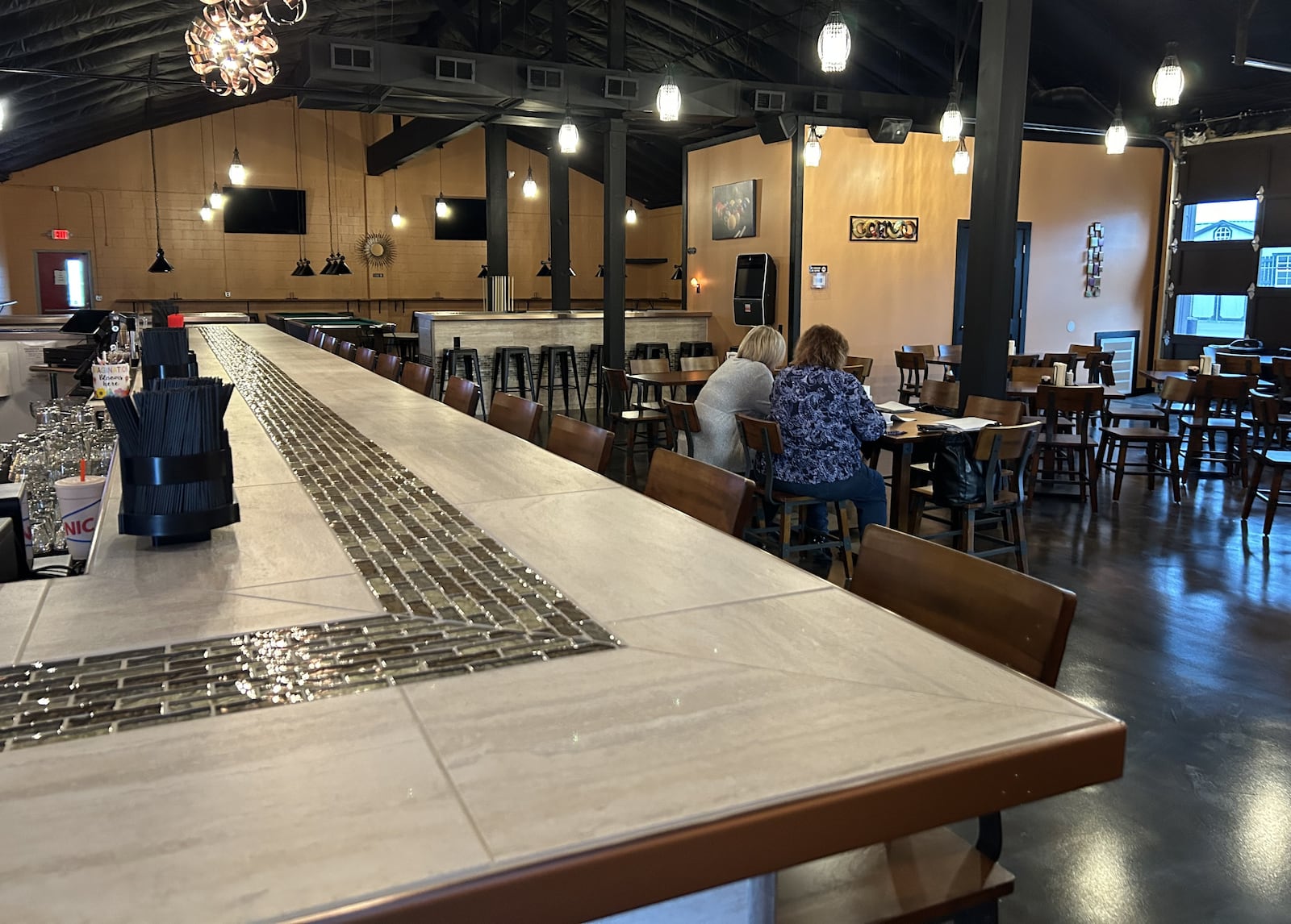 The new Mundy's Bar and Grill will slightly expand the menu from the old Mundy's Diner, and it has a large space for pool and dart leagues. JESSICA OROZCO/STAFF