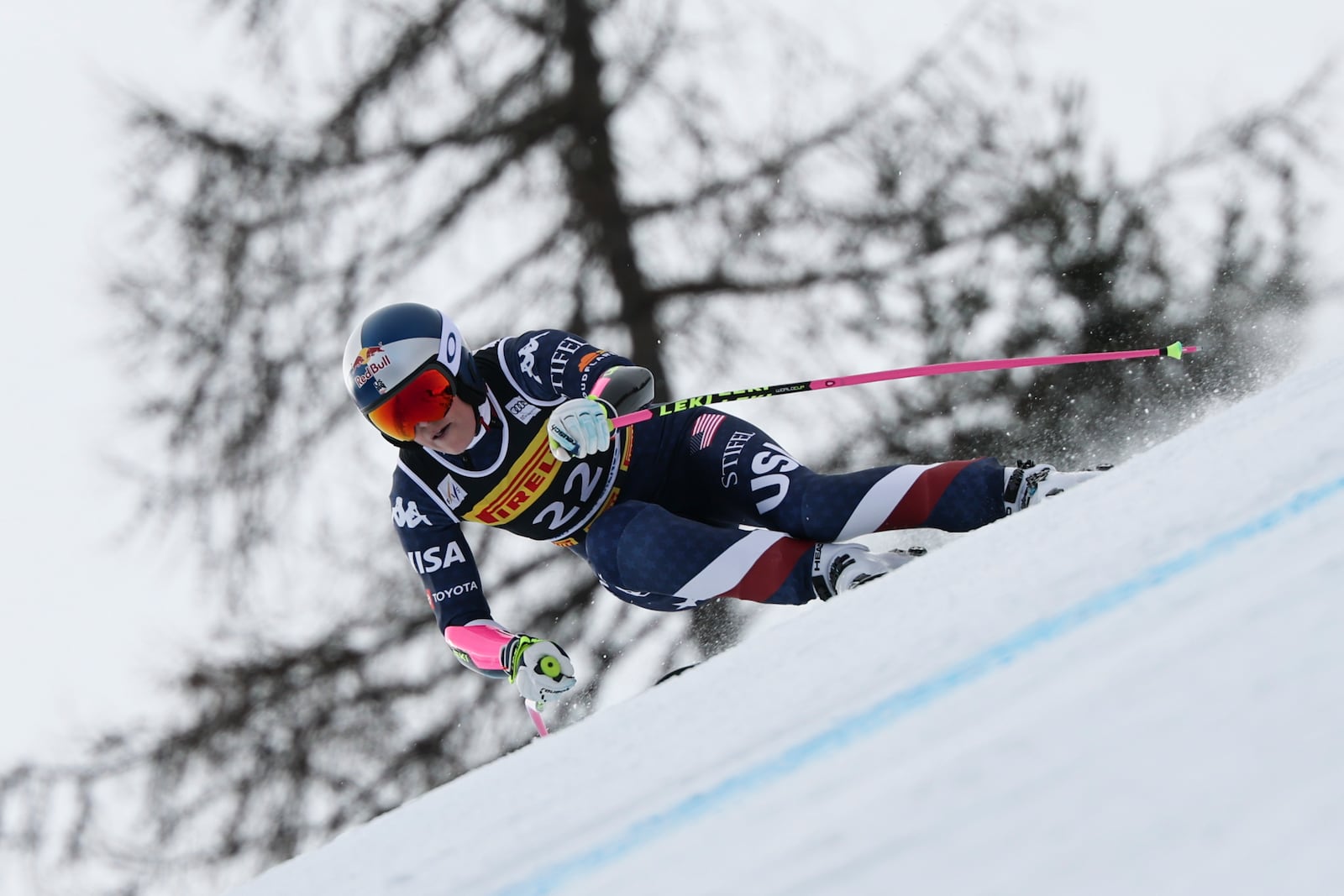 United States' Lindsey Vonn speeds down the course during an alpine ski, women's World Cup Super-G, in Cortina d'Ampezzo, Italy, Sunday, Jan. 19, 2025 (AP Photo/Marco Trovati)