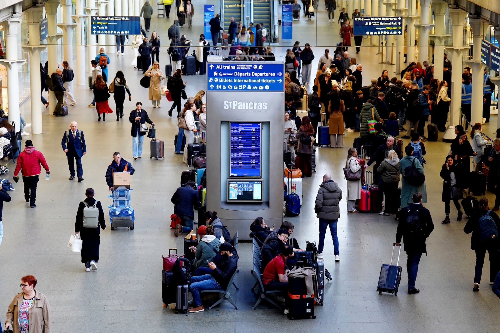 A general view of passengers at St Pancras International station in London, Friday March 7, 2025, after Eurostar trains to the capital have been halted following the discovery of an unexploded Second World War bomb near the tracks in Paris. (James Manning/PA via AP)