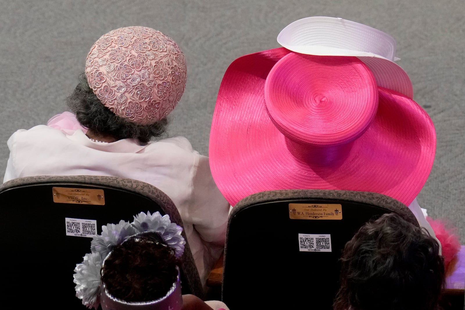 Attendees listen during a church service at New Birth Baptist Church before Democratic presidential nominee Vice President Kamala Harris speaks in Stonecrest, Ga., Sunday, Oct. 20, 2024. (AP Photo/Jacquelyn Martin)