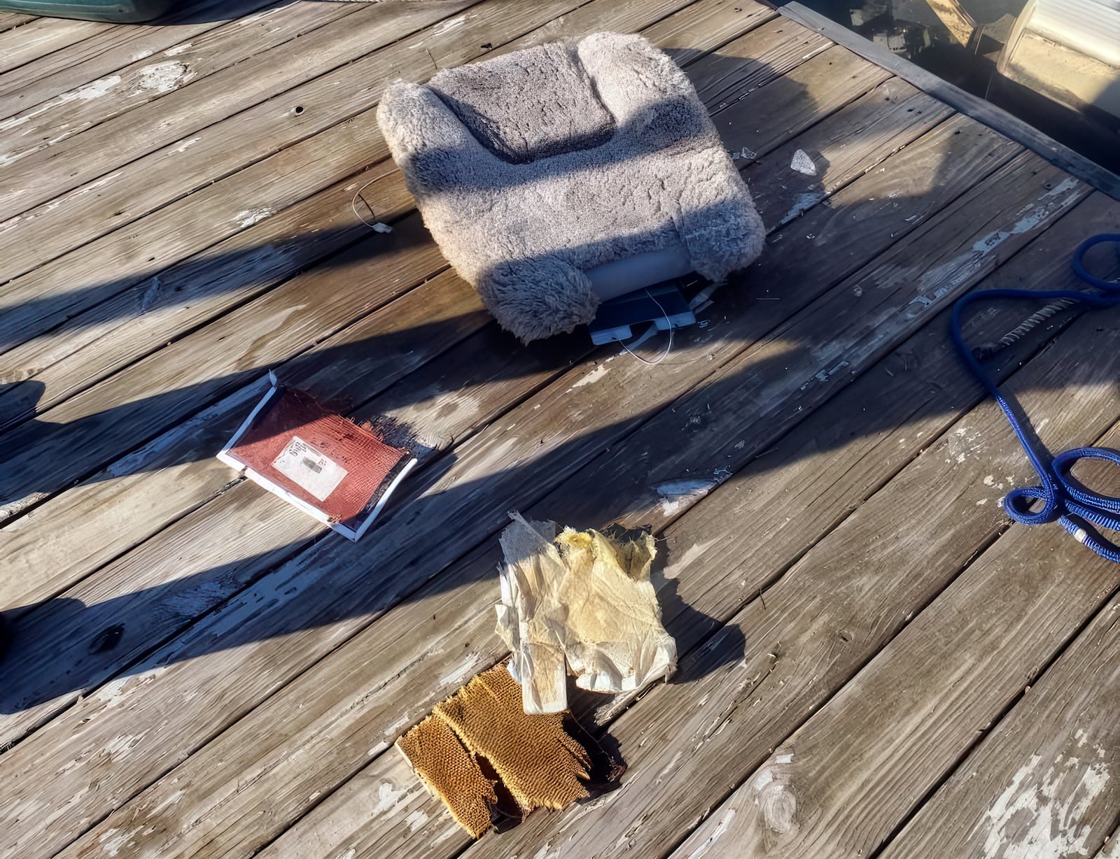 This image provided by Dean Naujoks shows debris recovered from the Potomoc River at on a dock on Daingerfield Island south of Ronald Reagan Washington National Airport in Alexandria, Va., Thursday, Jan. 30, 2025 (Dean Naujoks via AP)