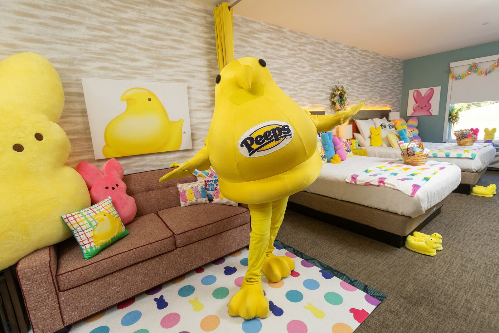 The PEEPS Chick Mascot is seen inside the PEEPS Sweet Suite at Home2 Suites by Hilton Easton in Pennsylvania. CONTRIBUTED/PEEPS