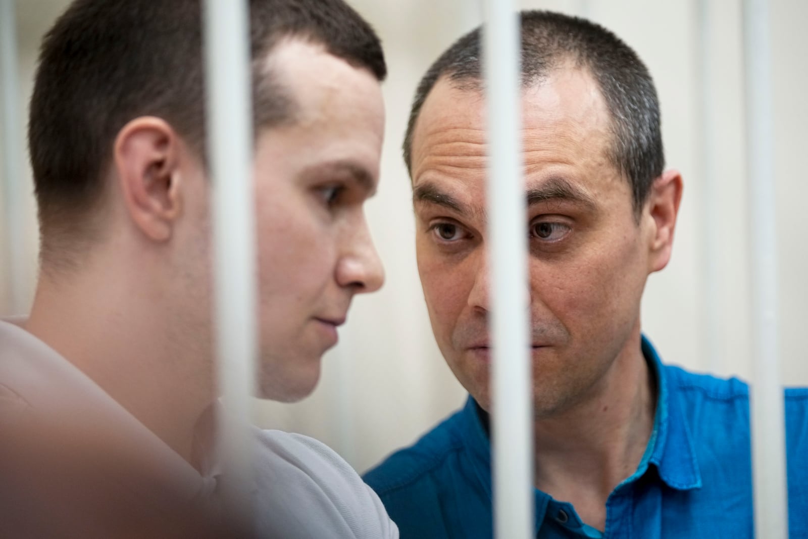 Lawyers Alexei Liptser, left, and Vadim Kobzev, who once represented late opposition leader Alexei Navalny, stand in a courtroom in Petushki, Vladimir region, about 120 kilometers (75 miles) east of Moscow, Russia, Friday, Jan. 17, 2025. (AP Photo/Pavel Bednyakov)