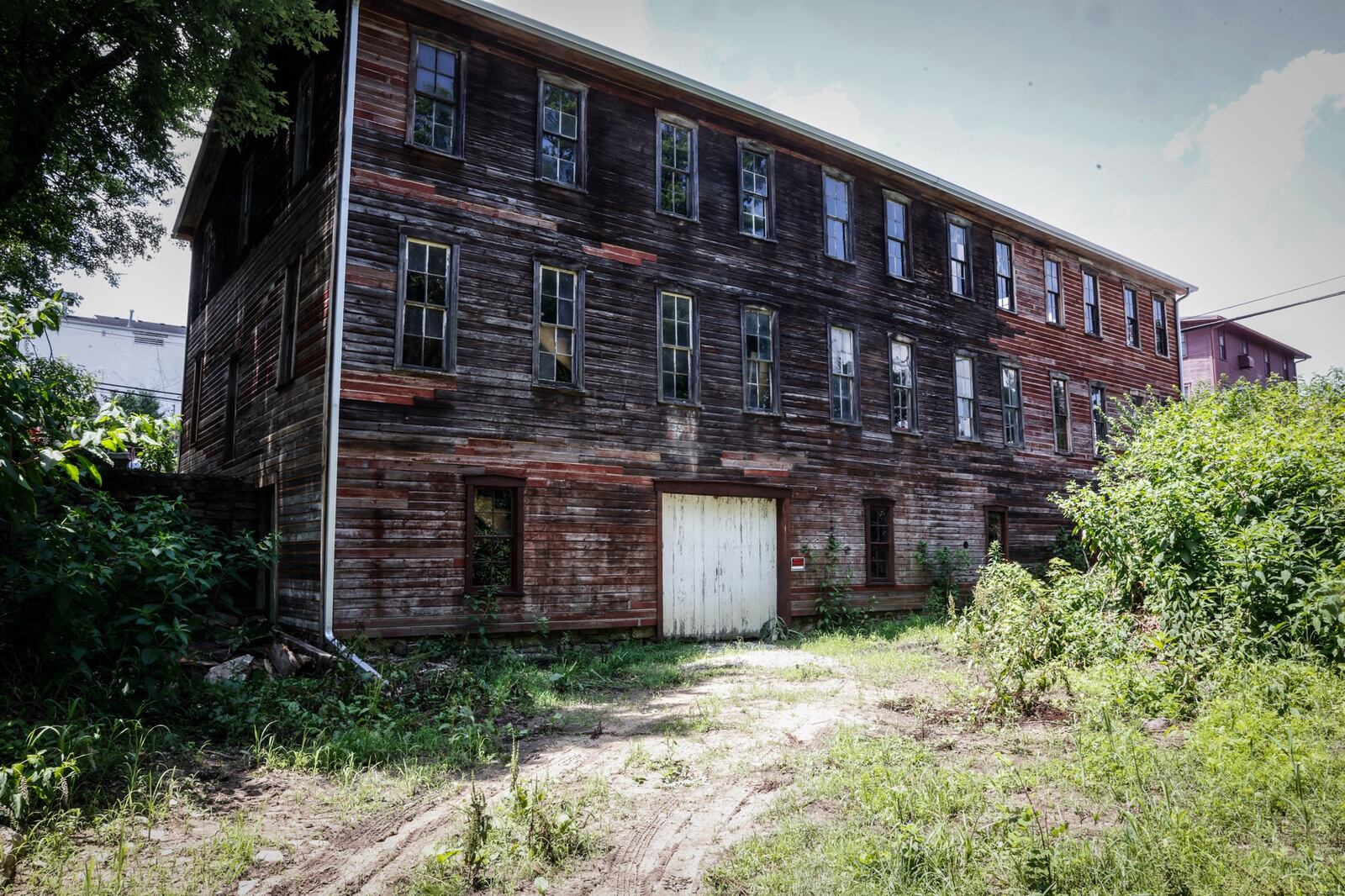 The buggy whip building in downtown Tipp City suffered a partial collapse in 2020. Now in summer 2023, the building is solid and the restoration continues. Jim Noelker/Staff