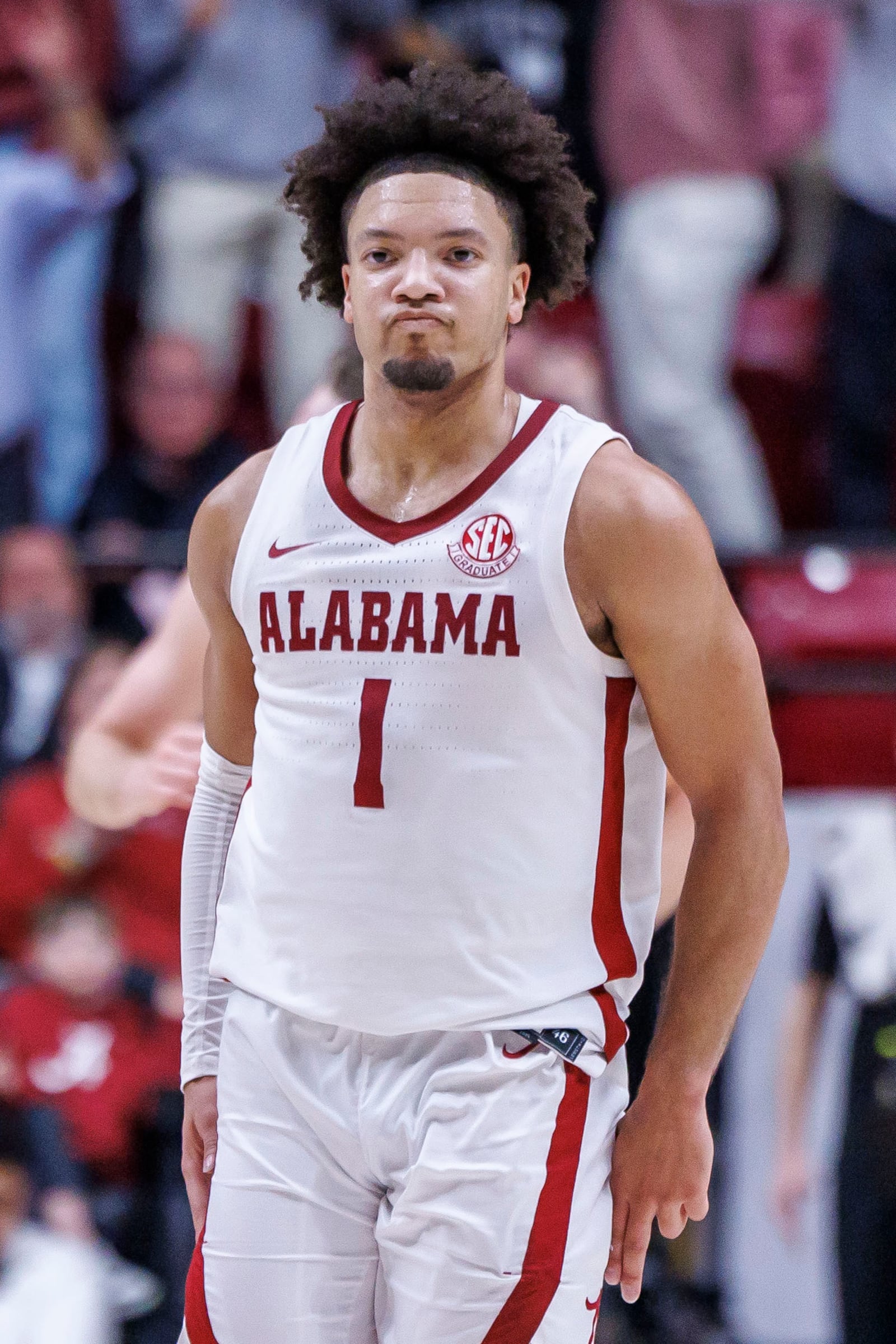 Alabama guard Mark Sears (1) reacts after hitting a 3-point shot during the first half of an NCAA college basketball game against Florida, Wednesday, March 5, 2025, in Tuscaloosa, Ala. (AP Photo/Vasha Hunt)