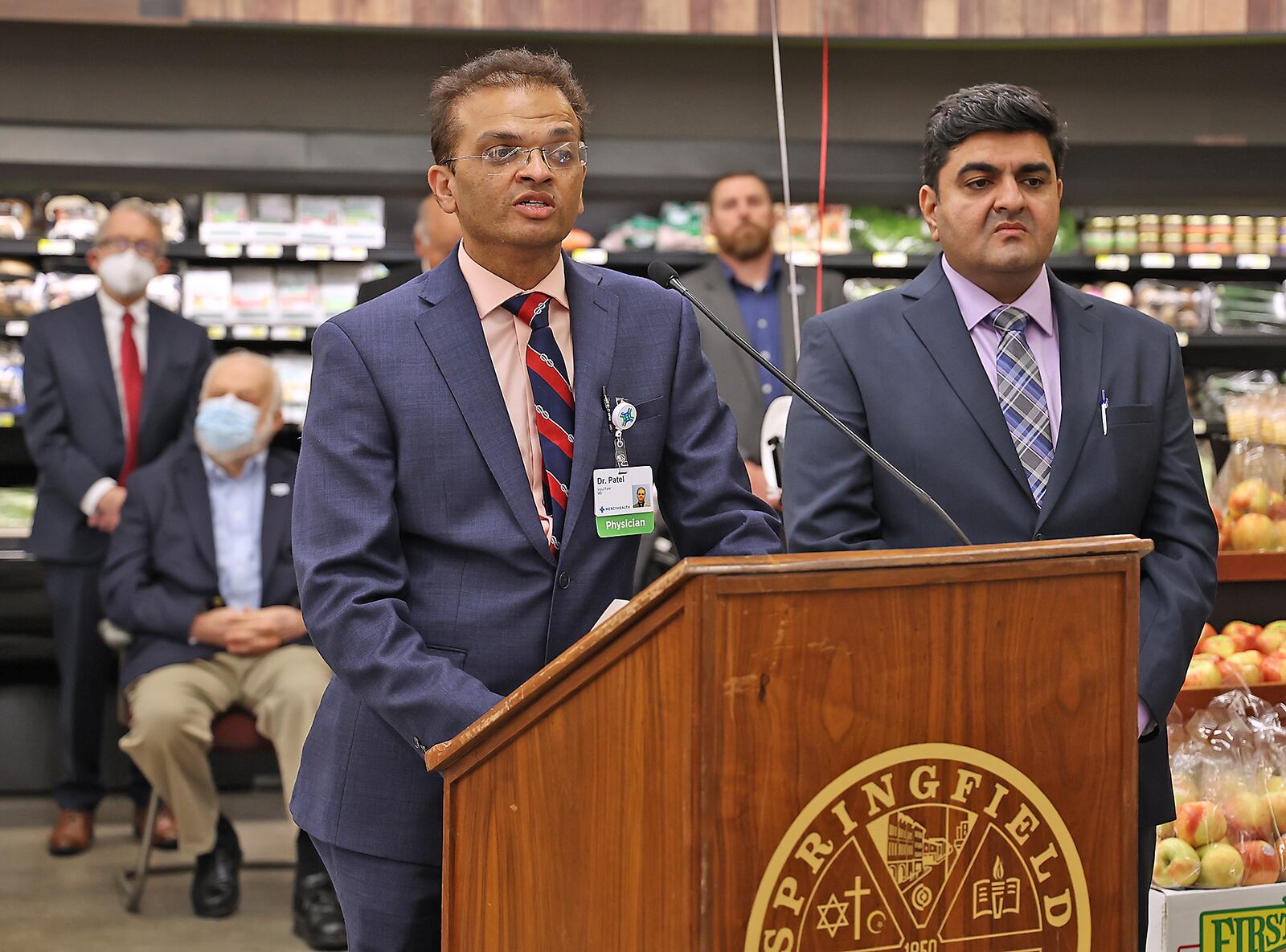 Dr. Vipul Patel, owner of the new Groceryland on South Limestone Street in Springfield, speaks druing the grand opening ceremony for the new store in December. The store provides fresh food for Springfield's south side, which was formally a food desert. BILL LACKEY/STAFF