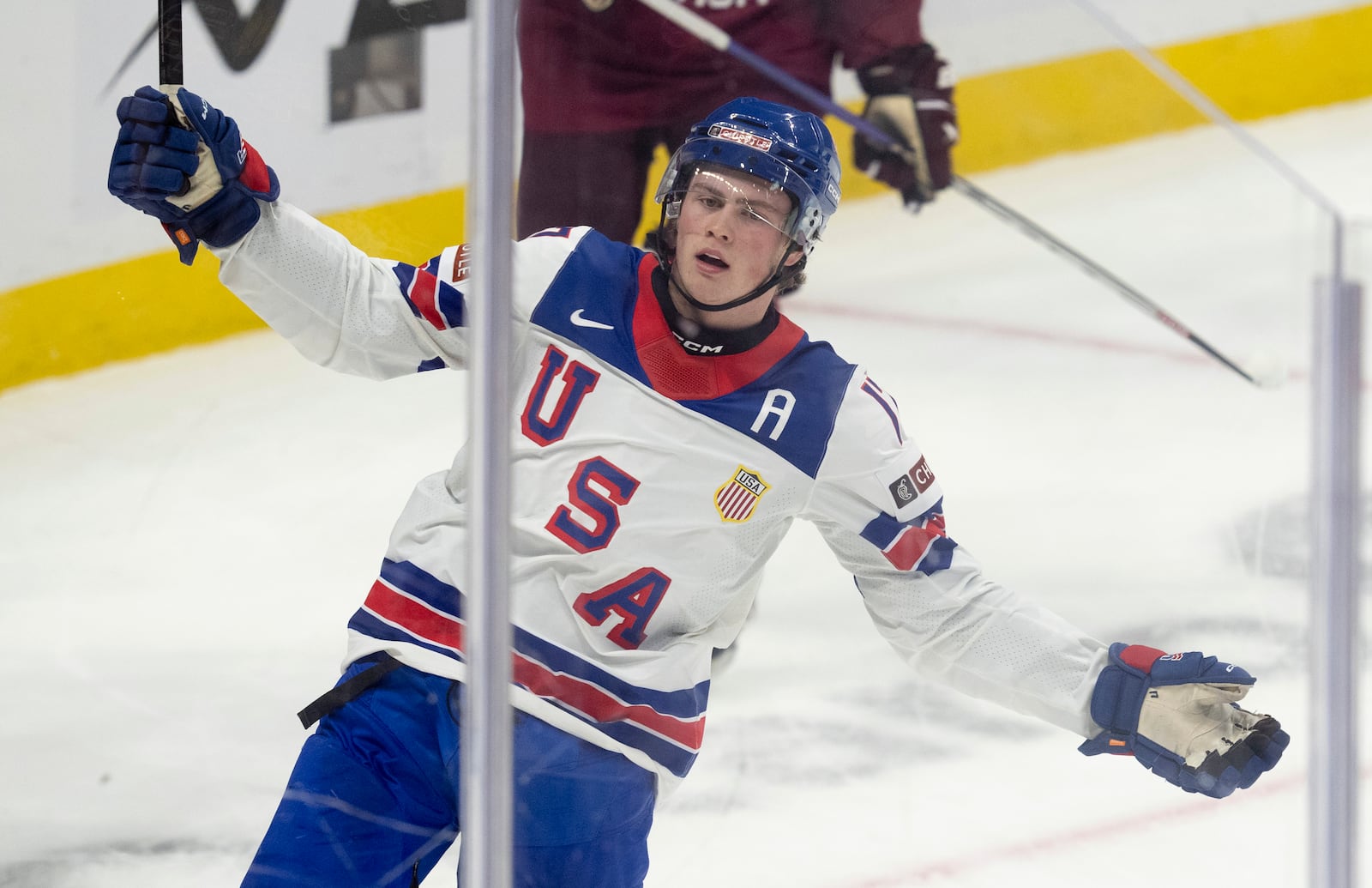 United States forward Danny Nelson celebrates his goal against Latvia during the second period of a IIHF World Junior Hockey Championship tournament game, Saturday, Dec.28, 2024 in Ottawa, Ontario. (Adrian Wyld/The Canadian Press via AP)