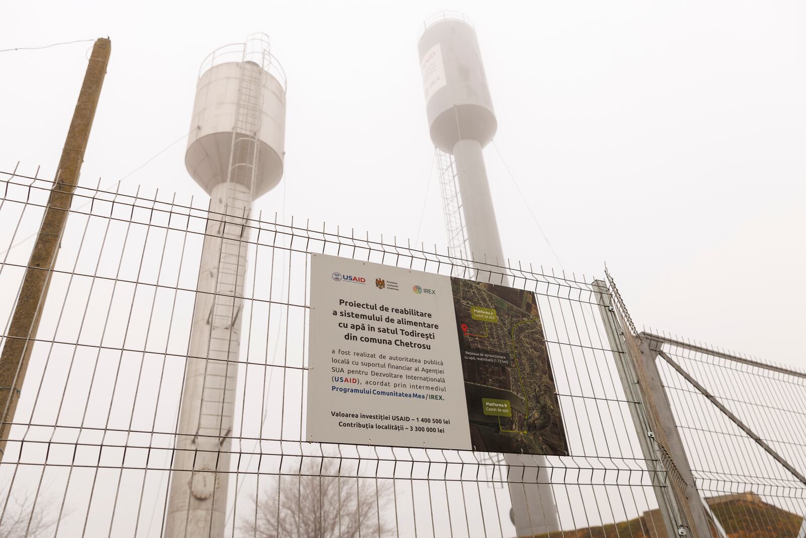 A banner presents a USAID supported project for the rehabilitation of two water towers in the village of Ciorescu, Moldova, Thursday, Jan. 30, 2025. (AP Photo/Aurel Obreja)