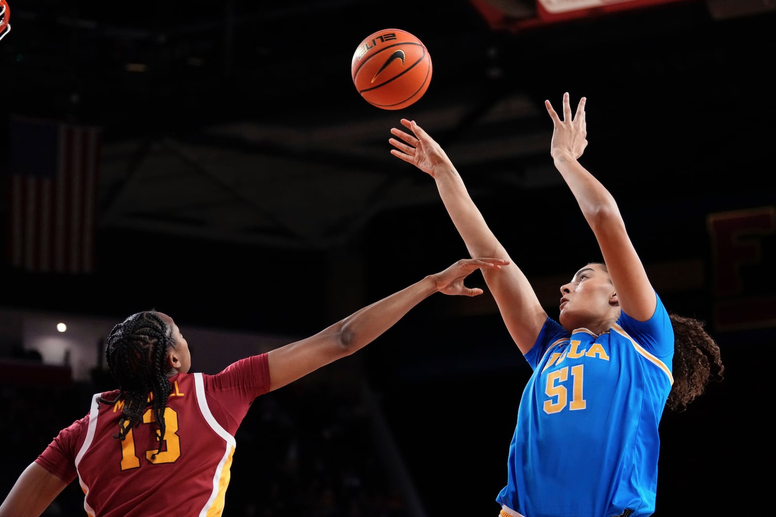 UCLA center Lauren Betts, right, shoots as Southern California center Rayah Marshall defends during the first half of an NCAA college basketball game Thursday, Feb. 13, 2025, in Los Angeles. (AP Photo/Mark J. Terrill)