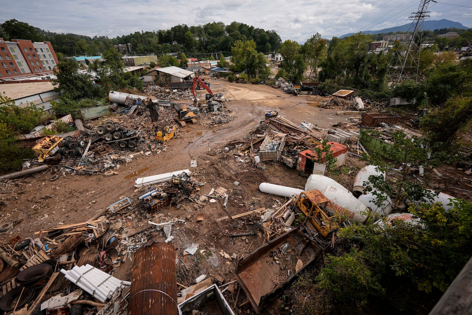 FILE - Debris is visible in the aftermath of Hurricane Helene, Sept. 30, 2024, in Asheville, N.C. (AP Photo/Mike Stewart, File)