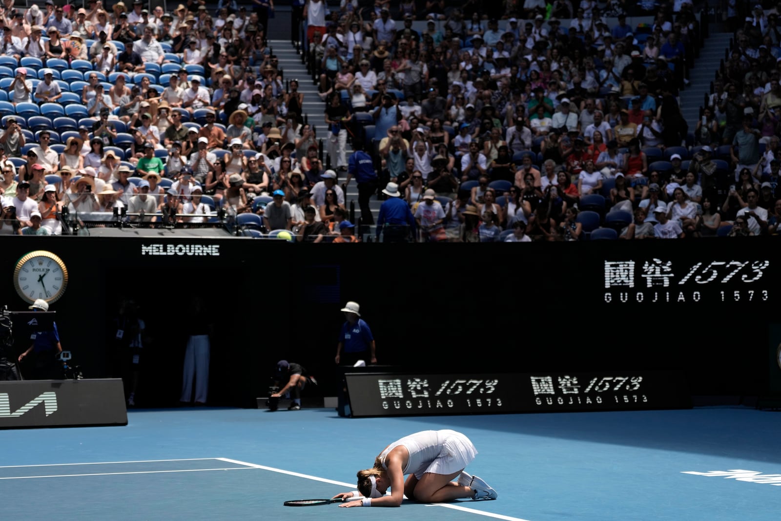 Paula Badosa of Spain celebrates after defeating Coco Gauff of the U.S. in their quarterfinal match at the Australian Open tennis championship in Melbourne, Australia, Tuesday, Jan. 21, 2025. (AP Photo/Ng Han Guan)