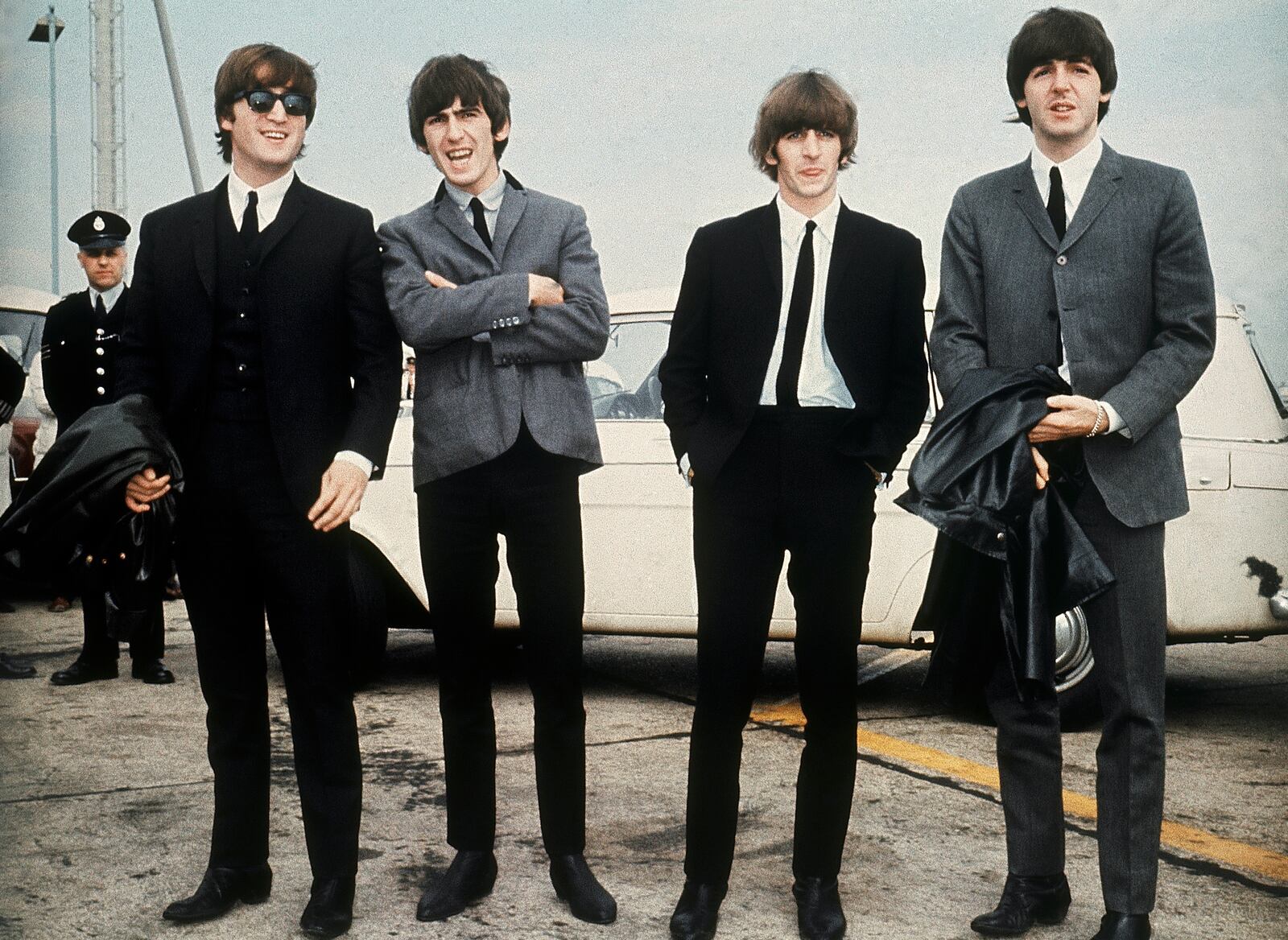 FILE - The Beatles, from left, John Lennon, George Harrison, Ringo Starr and Paul McCartney appear in Liverpool, England on July 10, 1964, for the premiere of their movie "A Hard Day's Night." (AP Photo, File)