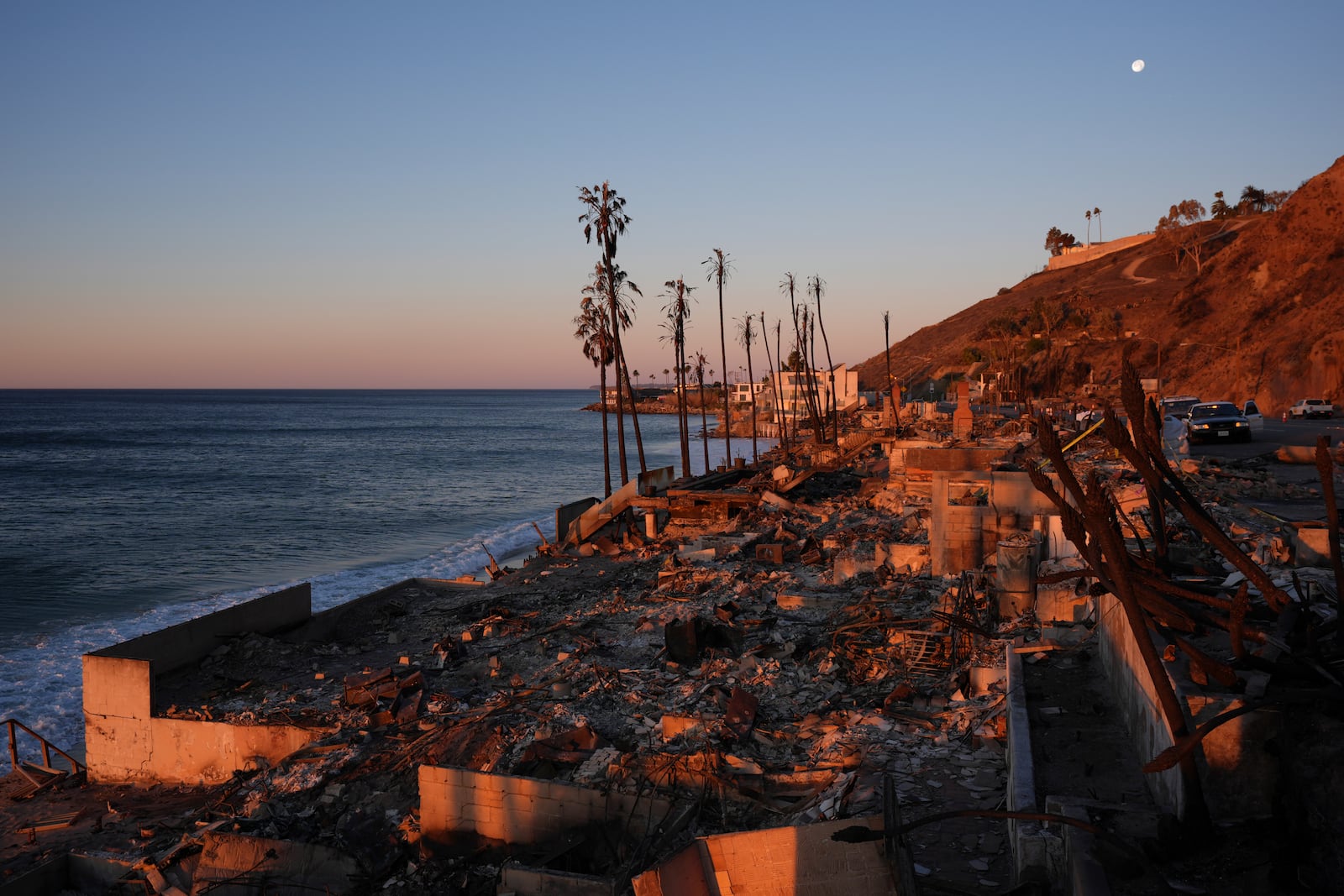 A beach front home destroyed by the Palisades Fire is seen in Malibu, Calif., Wednesday, Jan. 15, 2025. (AP Photo/Jae C. Hong)