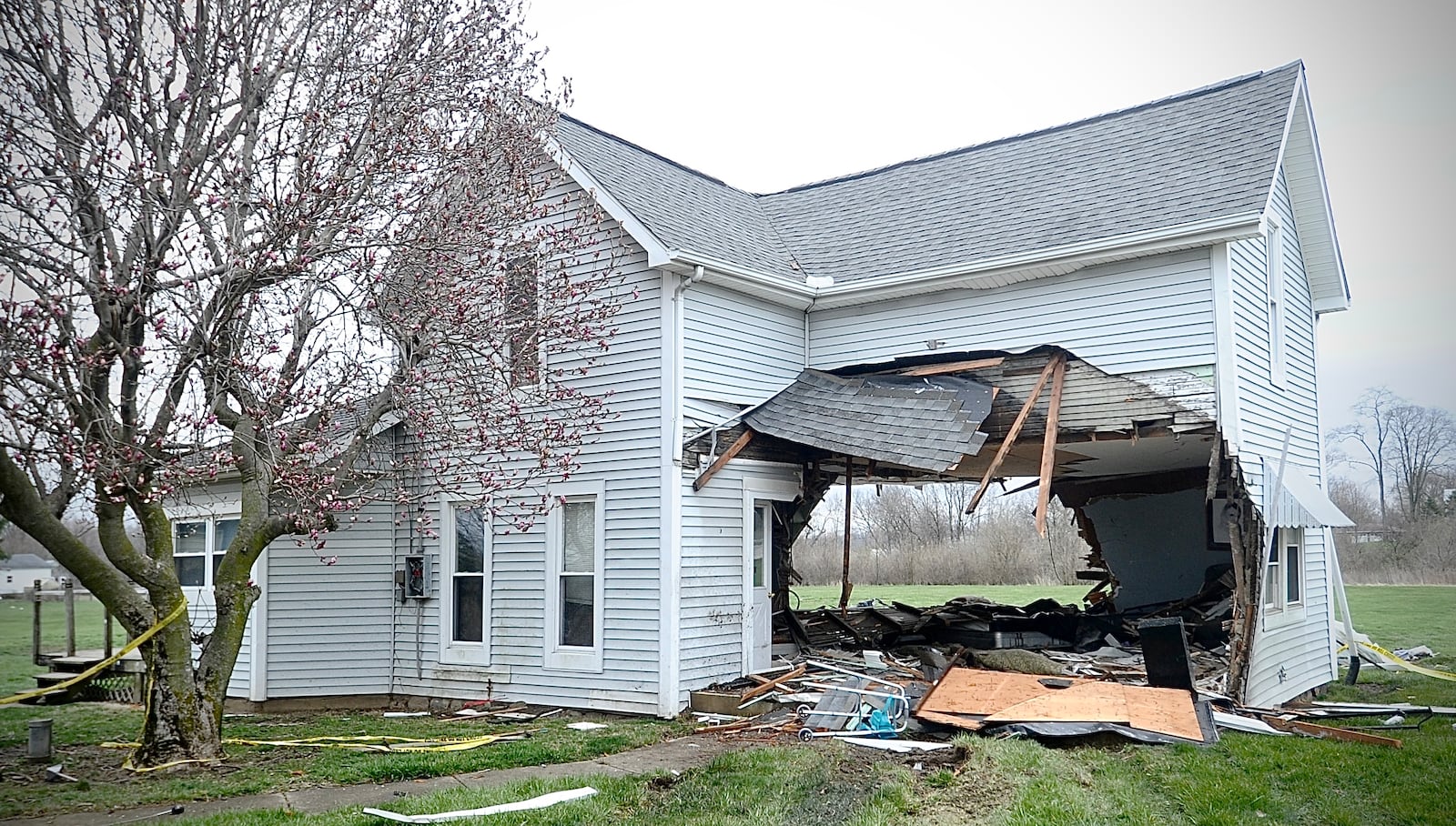 A semi drove through a house Thursday evening, March 30, 2023, at state Routes 571 and 201 in Bethel Twp. Homeowner Dave Fisher said Friday that his wife was inside but only suffered minor injuries. The house will be demolished and rebuilt, he said. MARSHALL GORBY \STAFF