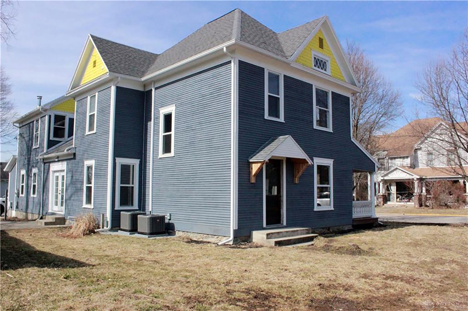 The rear has two newer HV/AC systems and a concrete patio with French door leading inside to the kitchen. CONTRIBUTED PHOTO