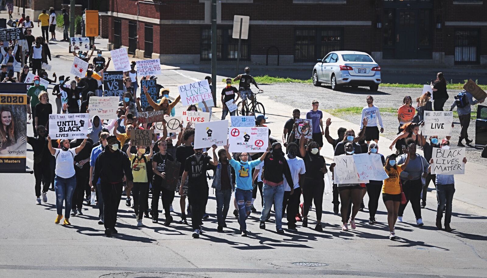 Several hundred people gathered at the Clark County Municipal Courthouse on Sunday, May 31, 2020, for a protest after the death of George Floyd in Minnesota. The crowd then marched through the streets. MARSHALL GORBY / STAFF