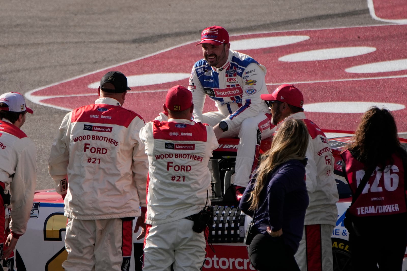 Josh Berry celebrates while sitting on his car after winning a NASCAR Cup Series auto race Sunday, March 16, 2025, in Las Vegas. (AP Photo/John Locher)