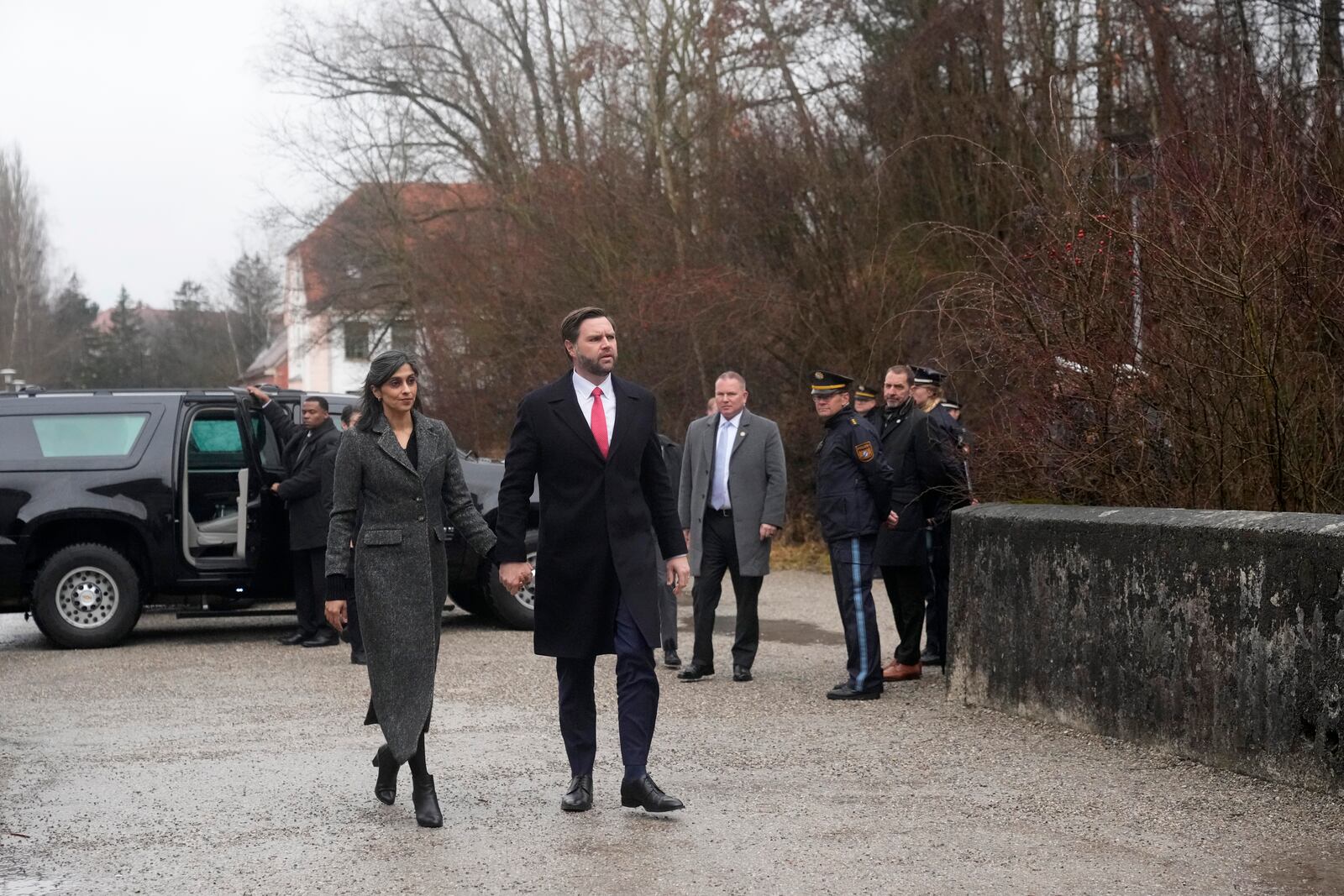 U.S. Vice President JD Vance and second lady Usha Vance arrive to visit the Dachau Concentration Camp Memorial Site outside Munich, Germany, Thursday, Feb. 13, 2025. (AP Photo/Matthias Schrader)