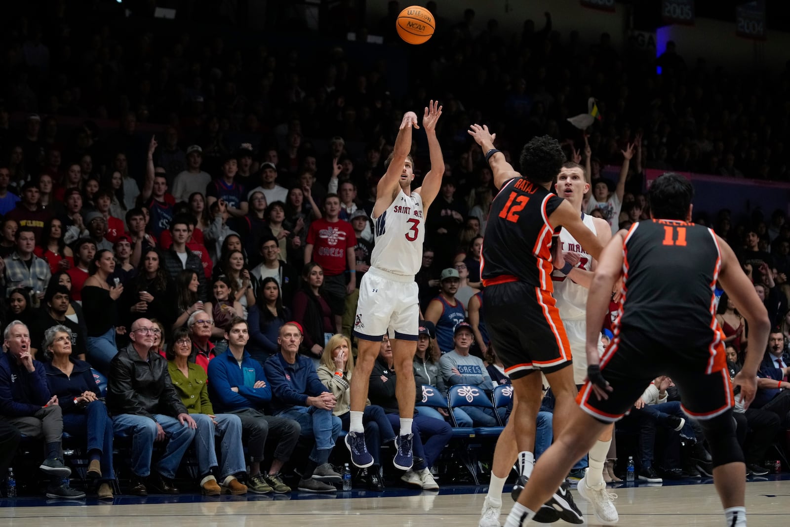 Saint Mary's guard Augustas Marciulionis (3) shoots a 3-point basket during the first half of an NCAA college basketball game against Oregon State, Saturday, March 1, 2025, in Moraga, Calif. (AP Photo/Godofredo A. Vásquez)