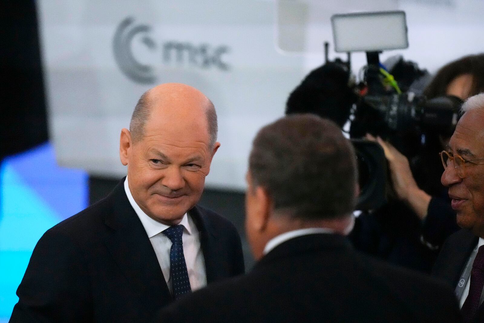 Germany's Chancellor Olaf Scholz, left, speaks with European Council President Antonio Costa, right, during the Munich Security Conference at the Bayerischer Hof Hotel in Munich, Germany, Saturday, Feb. 15, 2025. (AP Photo/Matthias Schrader)