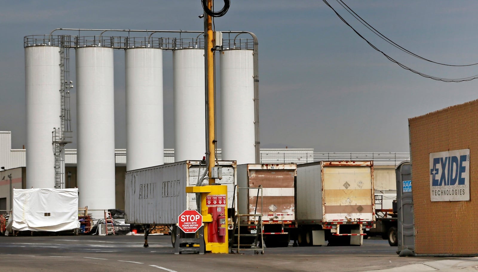 FILE - This March 10, 2015, file photo shows the Exide Technologies battery recycling plant in Vernon, Calif. (AP Photo/Nick Ut, File)