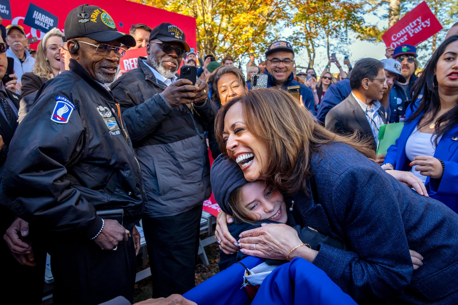 Democratic presidential nominee Vice President Kamala Harris hugs a child after speaking during a campaign event at Washington Crossing Historic Park, in Washington Crossing, Pa., Wednesday, Oct. 16, 2024. (AP Photo/Jacquelyn Martin)