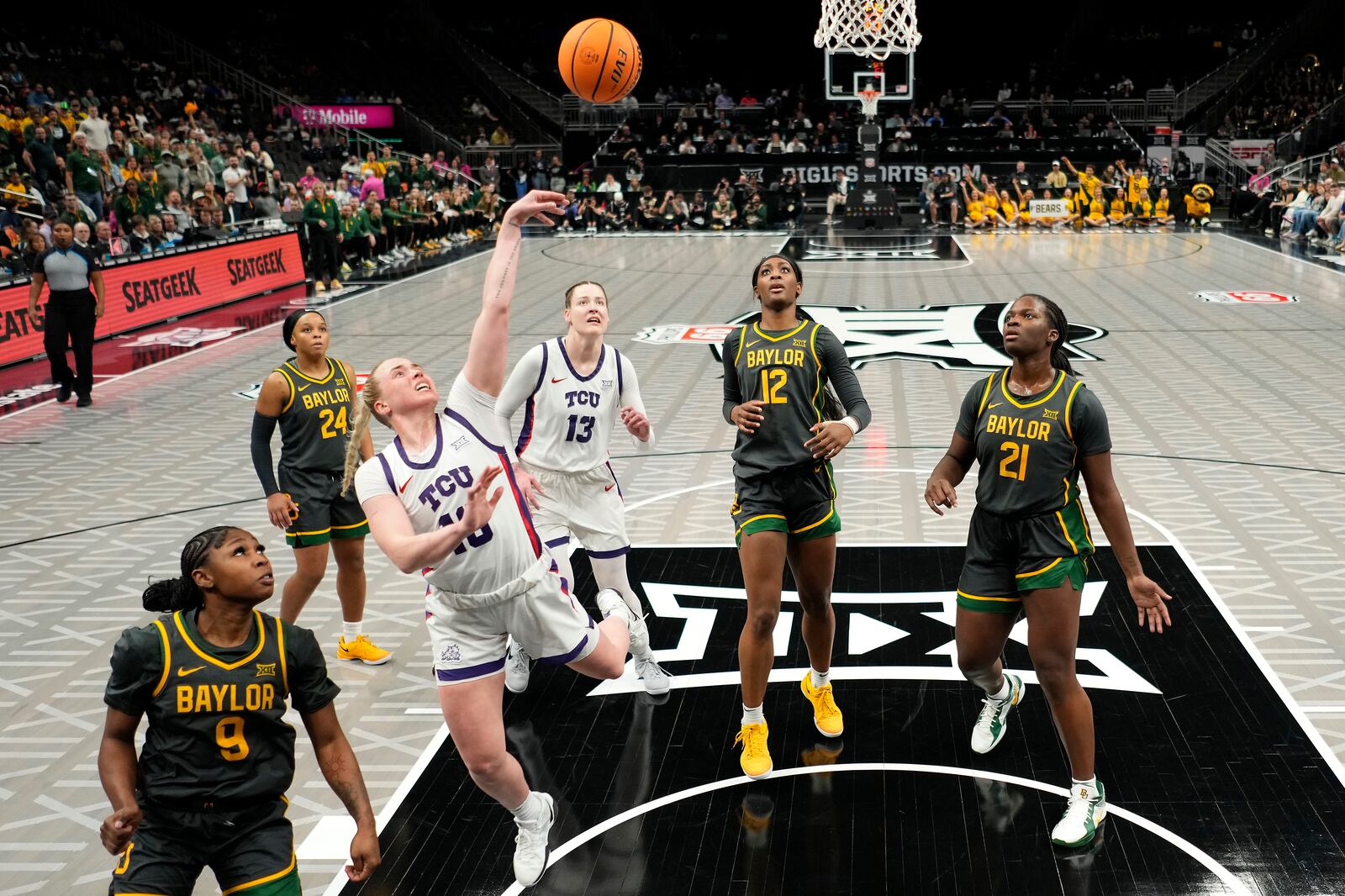 TCU guard Hailey Van Lith (10) puts up a shot during the second half of an NCAA college basketball game against Baylor for the Big 12 women's tournament championship Sunday, March 9, 2025, in Kansas City, Mo. (AP Photo/Charlie Riedel)